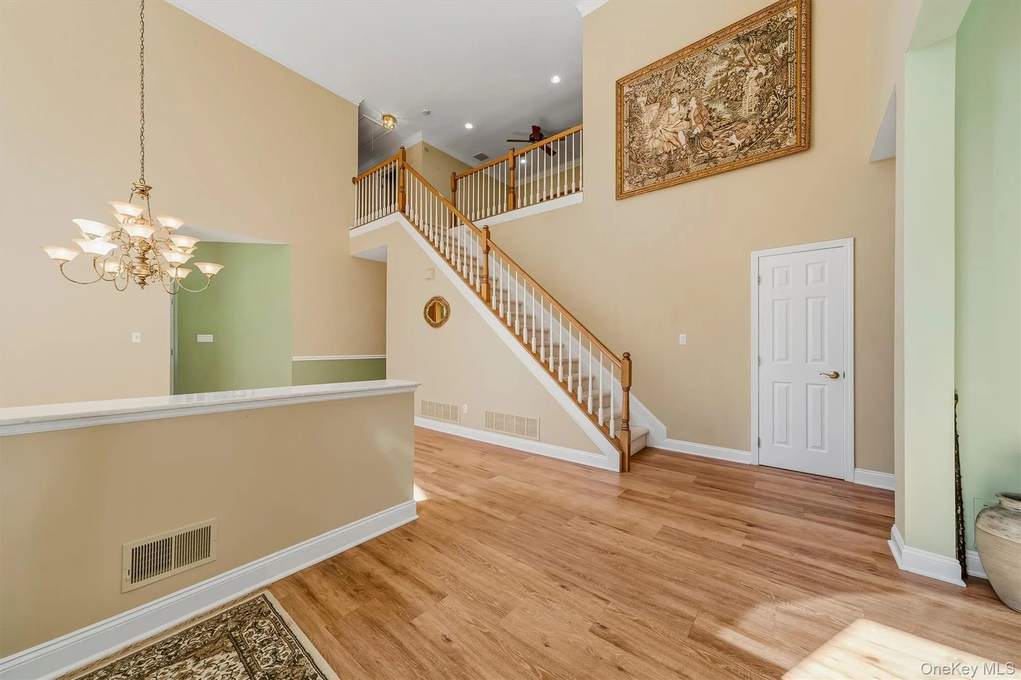 Open area living room with access to stairs Open area living room with access to stairs