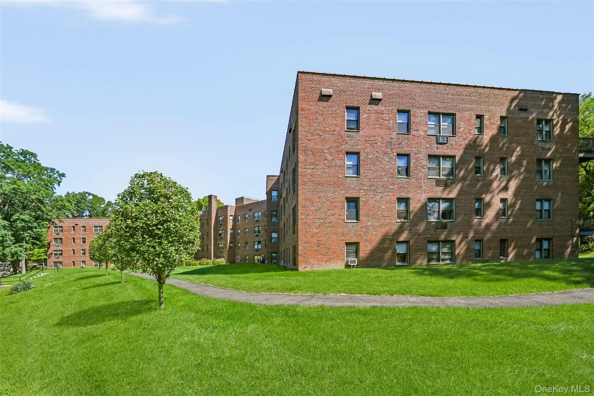 Classic brick architecture and wide green lawns create a welcoming place to come home to. Classic brick architecture and wide green lawns create a welcoming place to come home to.
