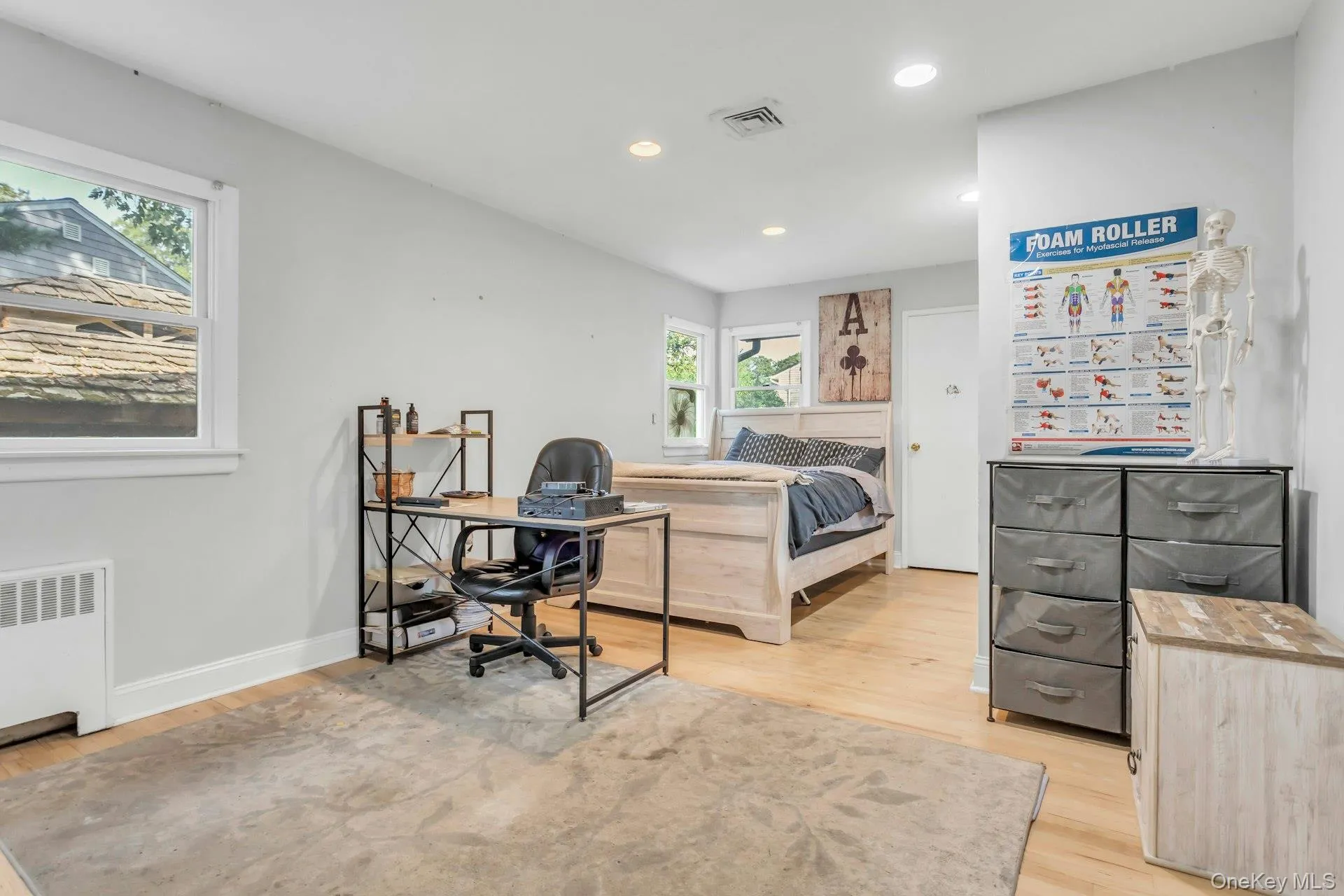 Hardwood flooring throughout, recessed lighting, and multiple windows allowing natural light Hardwood flooring throughout, recessed lighting, and multiple windows allowing natural light