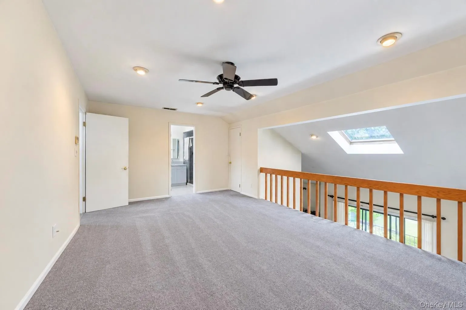 Primary Bedroom with attached Primary Bathroom, recessed lighting, ceiling fan and walk in closet Primary Bedroom with attached Primary Bathroom, recessed lighting, ceiling fan and walk in closet
