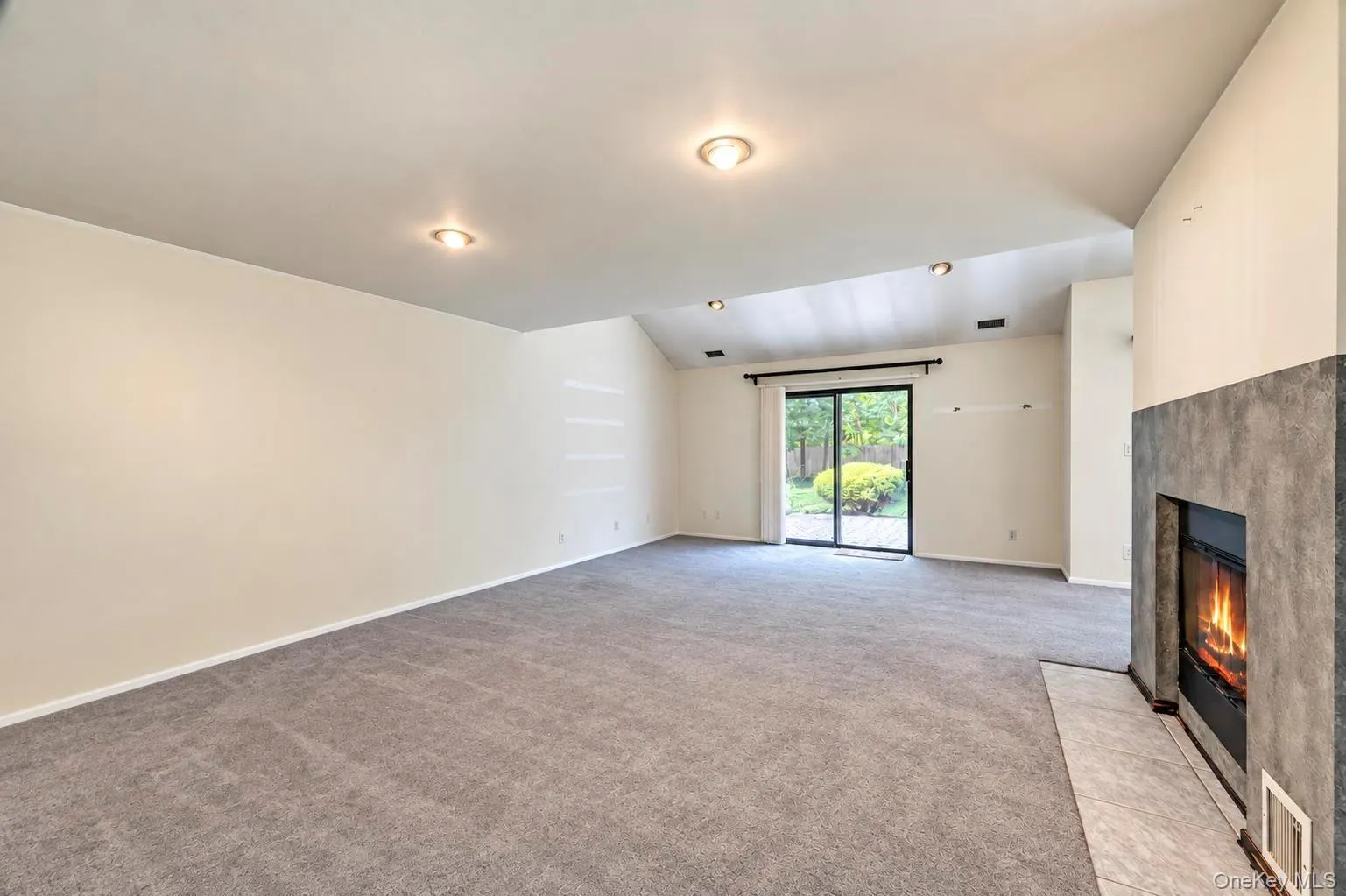 Open Floor Plan; Dining Area, Living Room and Den w/double sided fireplace, high vaulted ceilings and 2 sets of glass sliders to patio area Open Floor Plan; Dining Area, Living Room and Den w/double sided fireplace, high vaulted ceilings and 2 sets of glass sliders to patio area
