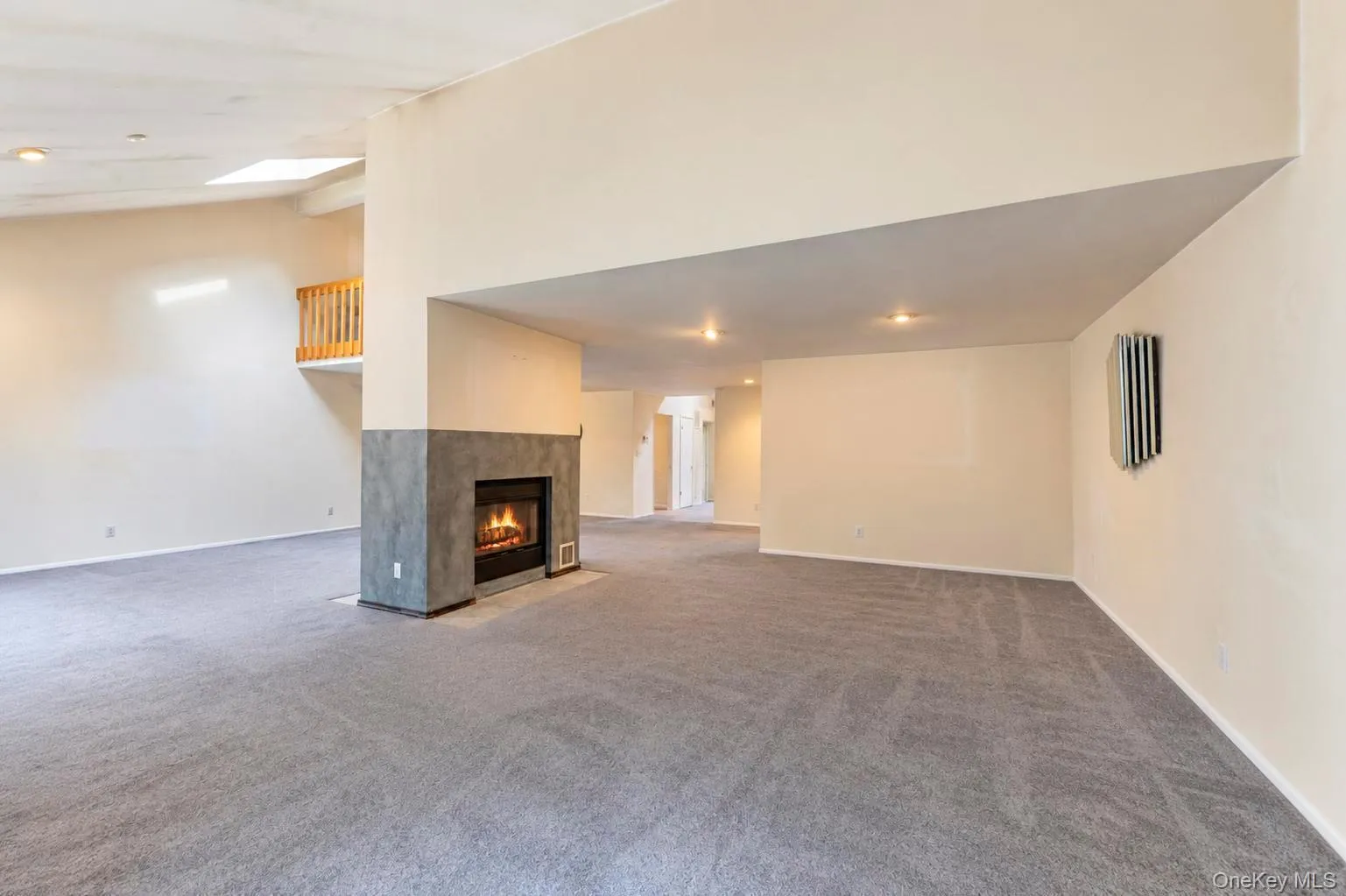 Open Floor Plan; Dining Area, Living Room and Den w/double sided fireplace, high vaulted ceilings and 2 sets of glass sliders to patio area Open Floor Plan; Dining Area, Living Room and Den w/double sided fireplace, high vaulted ceilings and 2 sets of glass sliders to patio area