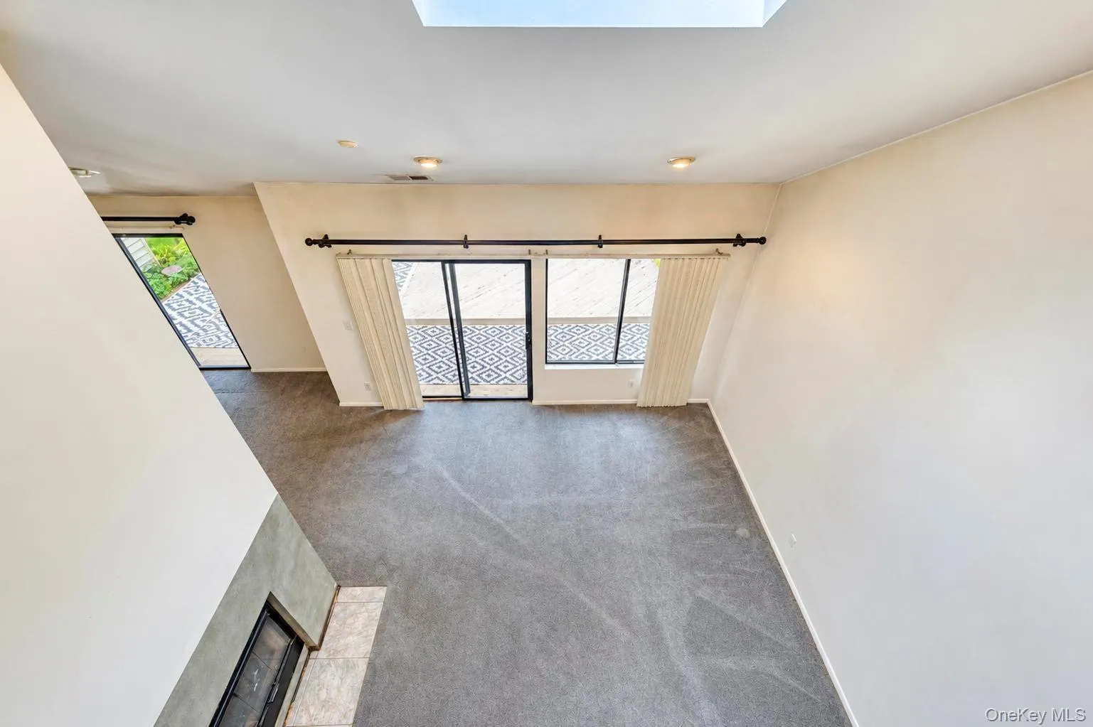 View from Primary Bedroom Loft to Living Area Below View from Primary Bedroom Loft to Living Area Below