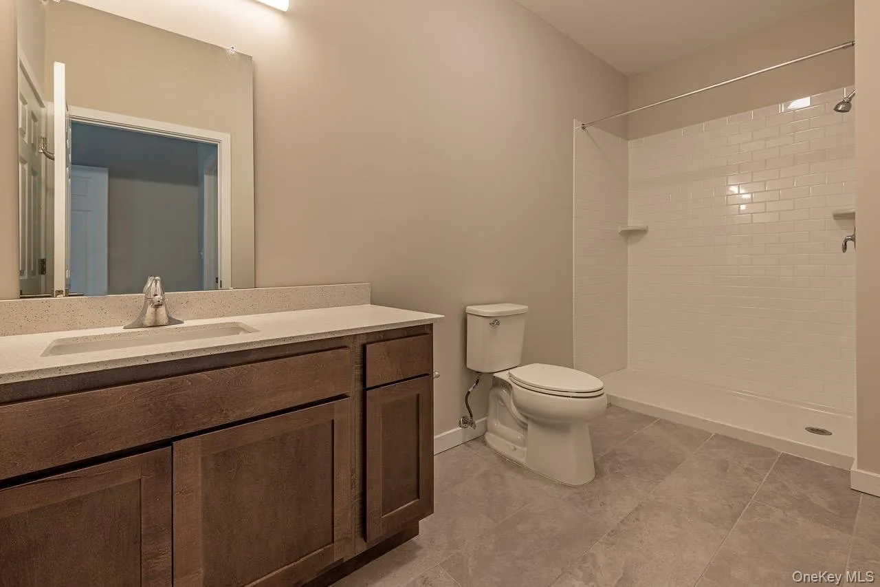 Representative bathroom showing finishes and fixtures at Zero Place. Representative bathroom showing finishes and fixtures at Zero Place.
