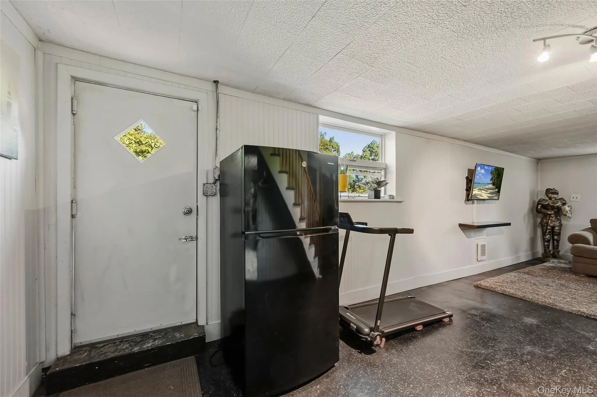Easy access to the patios, hot tub and back yard from the family room. Easy access to the patios, hot tub and back yard from the family room.