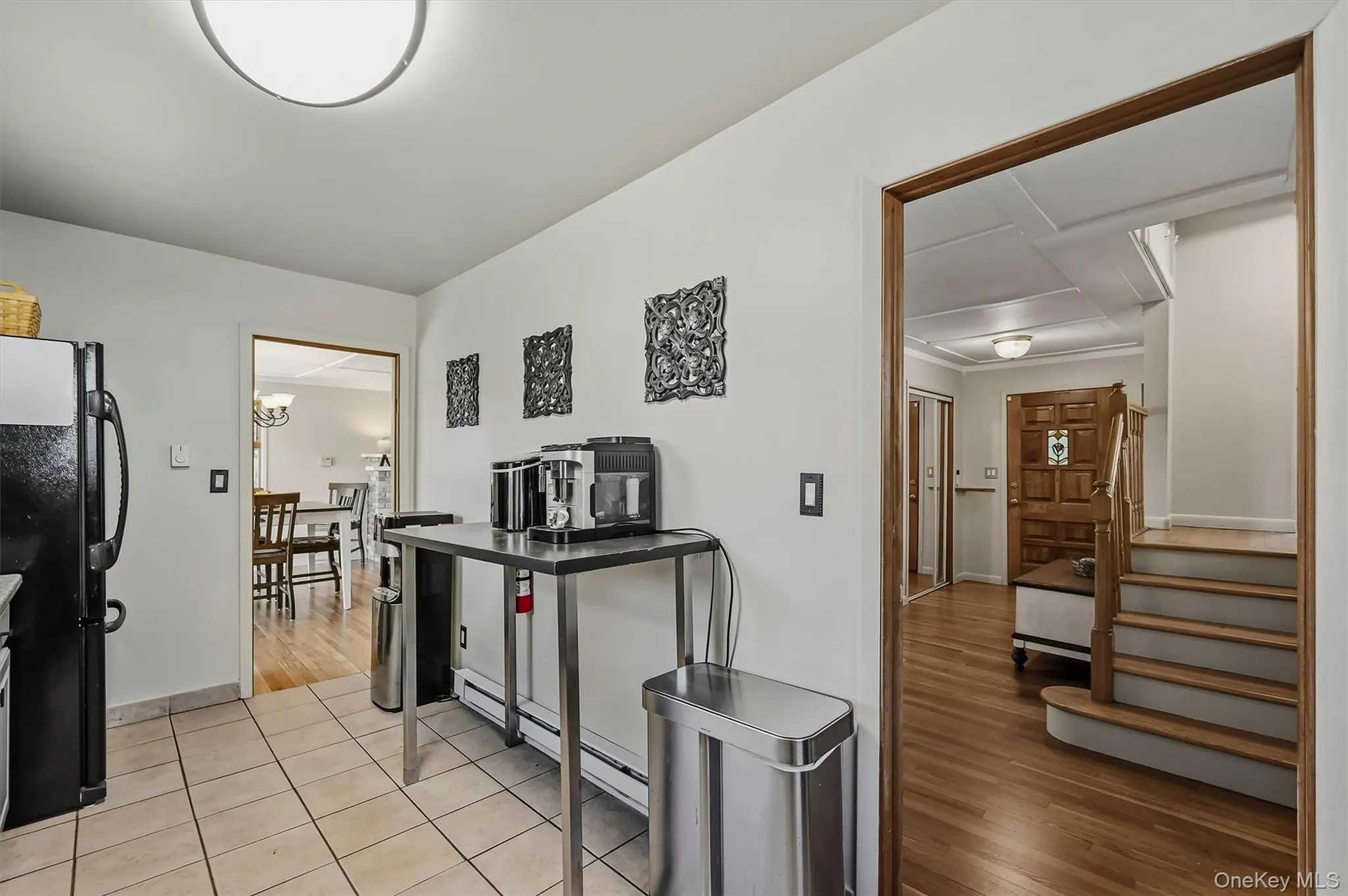 Easy flow from the dining room or from the upstairs bedrooms Easy flow from the dining room or from the upstairs bedrooms