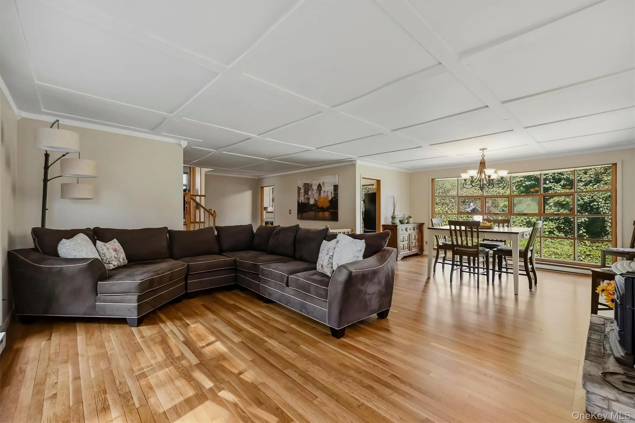 Sunlight bounces off the gleaming hardwood floors Sunlight bounces off the gleaming hardwood floors