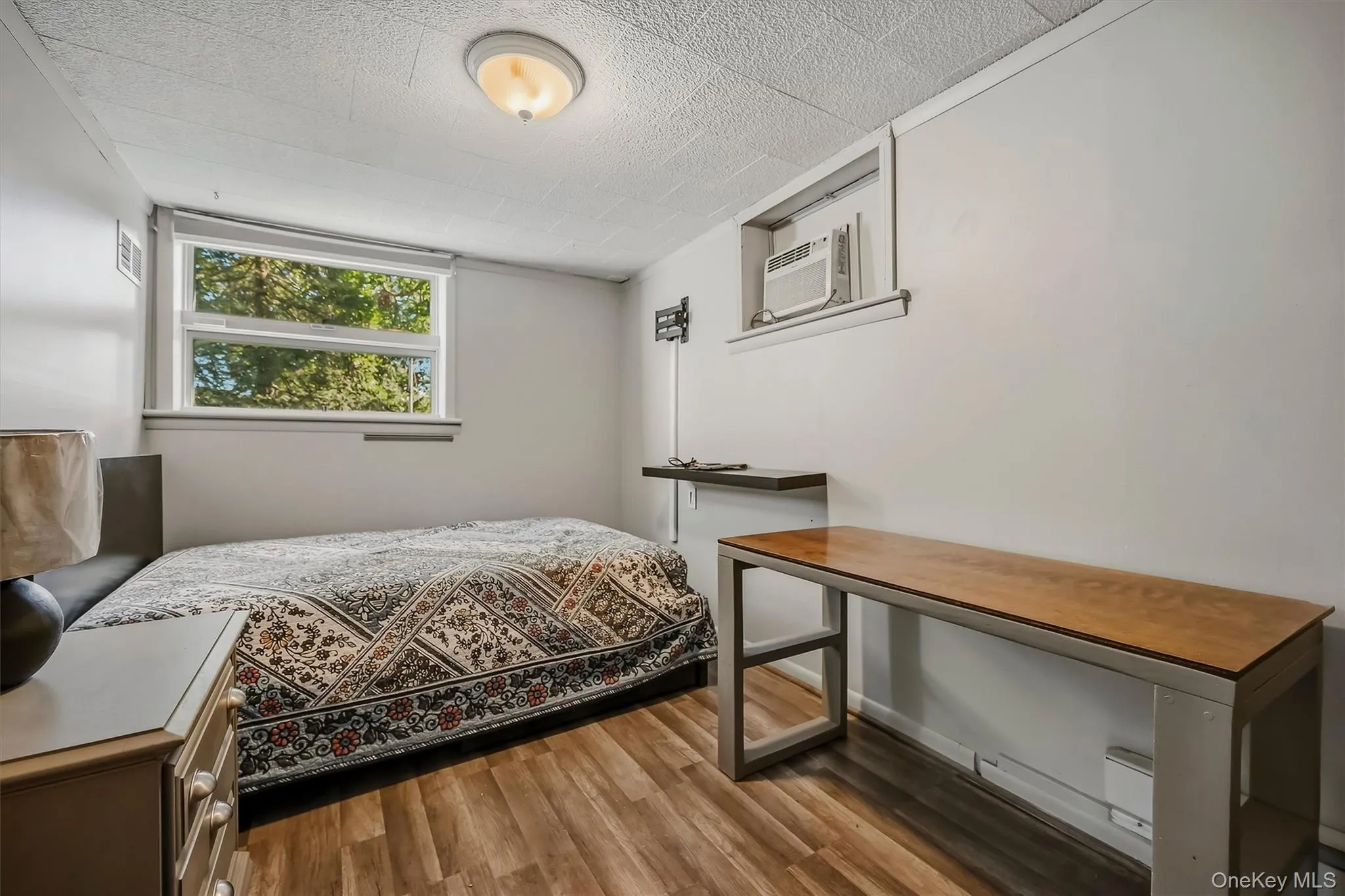 Used as a guest room which features newer laminate floors Used as a guest room which features newer laminate floors