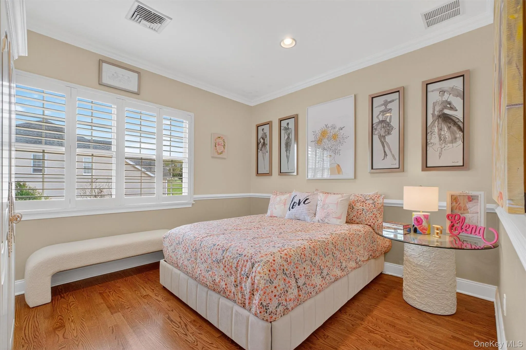 Bathed in natural light from a wall of windows, Bedroom #3 is truly any little girl's dream room. Its gleaming hardwood floors shimmer in the sunlight, while the ballet-inspired décor adds a touch of whimsical elegance. A freshly updated walk-in closet offers plenty of space for treasured outfits and costumes, and the direct access to the Jack & Jill full bathroom makes this suite feel both magical and practical—perfect for a child to grow, play, and imagine. Bathed in natural light from a wall of windows, Bedroom #3 is truly any little girl's dream room. Its gleaming hardwood floors shimmer in the sunlight, while the ballet-inspired décor adds a touch of whimsical elegance. A freshly updated walk-in closet offers plenty of space for treasured outfits and costumes, and the direct access to the Jack & Jill full bathroom makes this suite feel both magical and practical—perfect for a child to grow, play, and imagine.