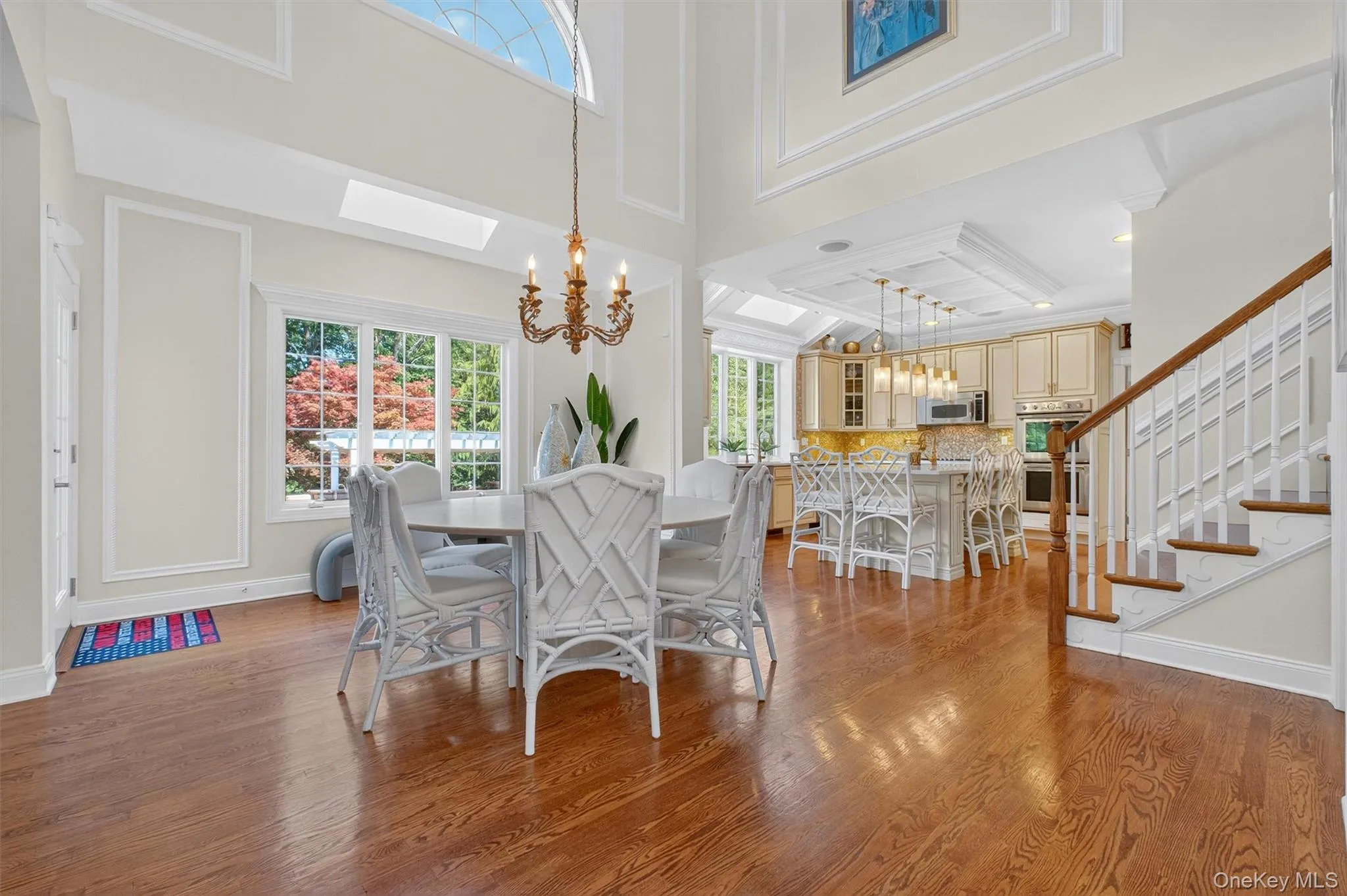 Savor the beauty and comfort of the eat-in dining area perfectly nestled between the family room and kitchen. Flooded with natural light from oversized windows, this inviting space offers sweeping views of rolling hills and treetops, transforming everyday meals into memorable occasions. Its open-concept layout allows for effortless movement between the kitchen, dining area, and family room, while a glass-paneled door opens directly onto the outdoor patio—ideal for indoor-outdoor entertaining or a tranquil morning coffee. Savor the beauty and comfort of the eat-in dining area perfectly nestled between the family room and kitchen. Flooded with natural light from oversized windows, this inviting space offers sweeping views of rolling hills and treetops, transforming everyday meals into memorable occasions. Its open-concept layout allows for effortless movement between the kitchen, dining area, and family room, while a glass-paneled door opens directly onto the outdoor patio—ideal for indoor-outdoor entertaining or a tranquil morning coffee.