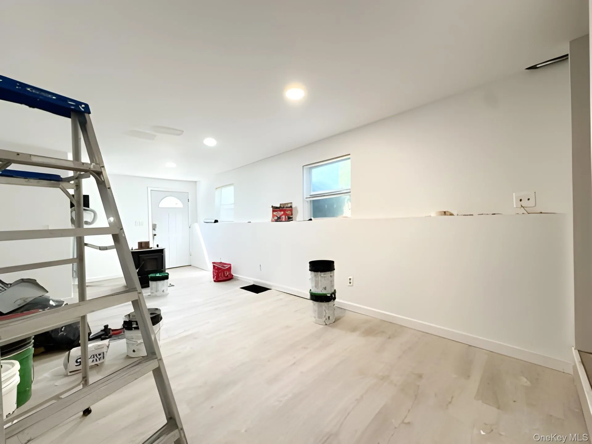 Exercise room featuring light wood-style floors and recessed lighting Exercise room featuring light wood-style floors and recessed lighting