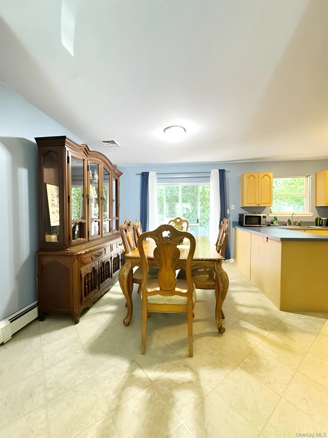Dining room with baseboard heating Dining room with baseboard heating