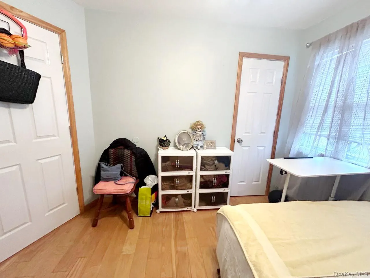 Bedroom featuring light wood-type flooring Bedroom featuring light wood-type flooring