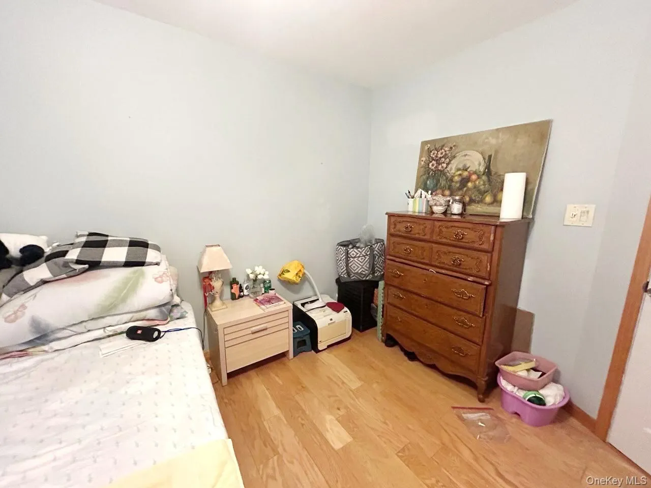 Bedroom with light wood-style floors Bedroom with light wood-style floors