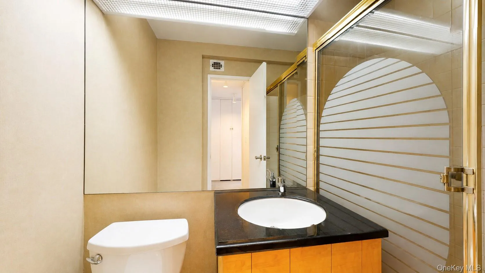 Vanity with an integrated sink and sharp black Granite countertop Vanity with an integrated sink and sharp black Granite countertop