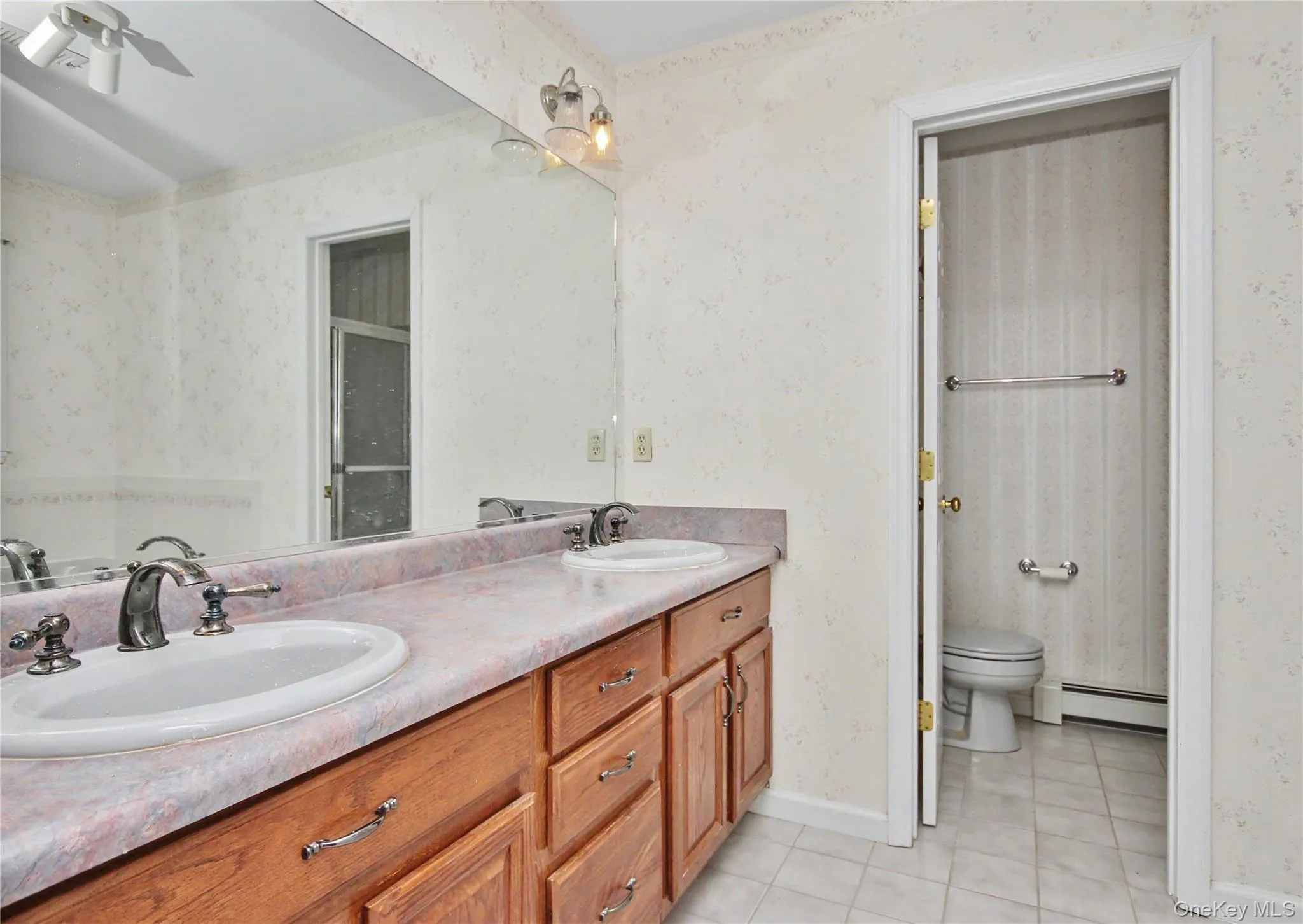 Primary Bathroom with Double Sink Vanity Primary Bathroom with Double Sink Vanity