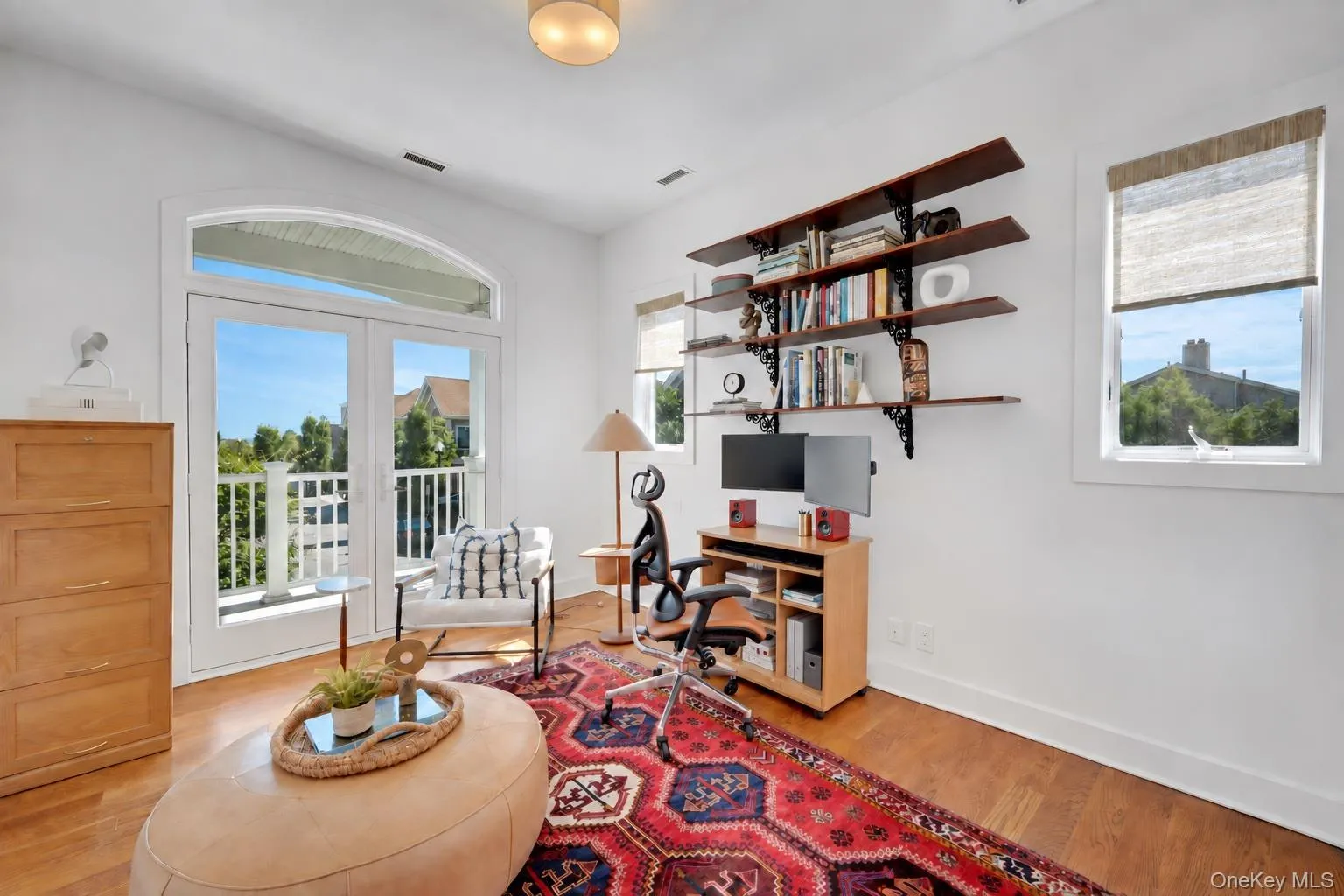 Third bedroom currently being used as an office. Glass French Doors leading out to large terrace and water views. Large closet. Third bedroom currently being used as an office. Glass French Doors leading out to large terrace and water views. Large closet.