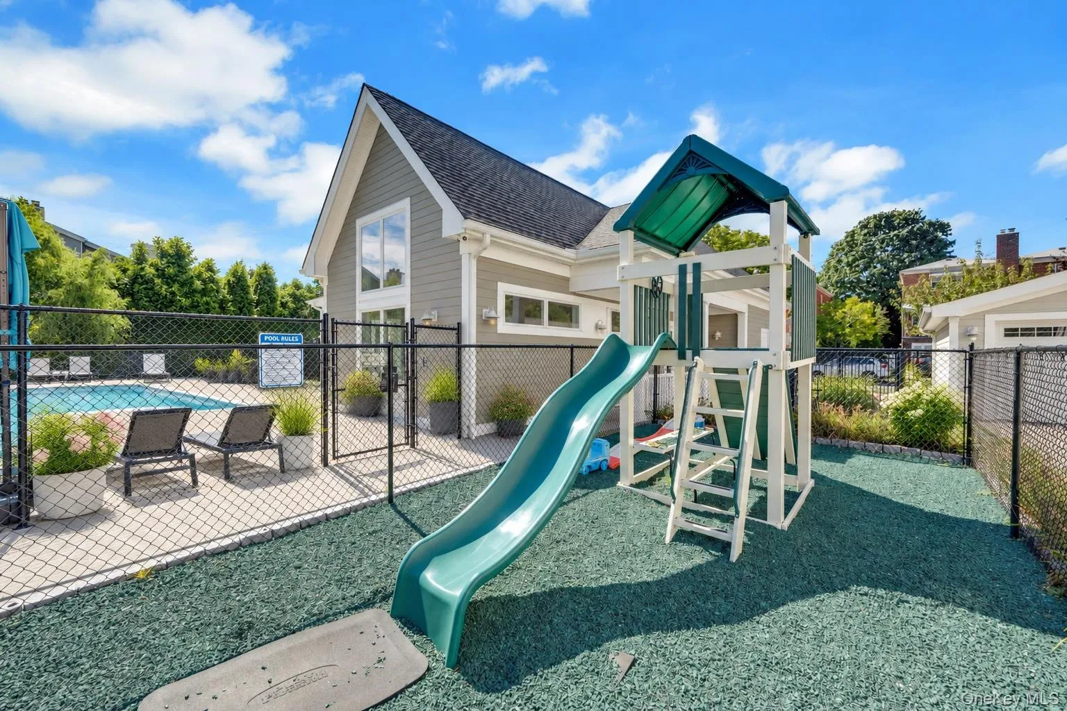 Playground located next to the pool. Playground located next to the pool.