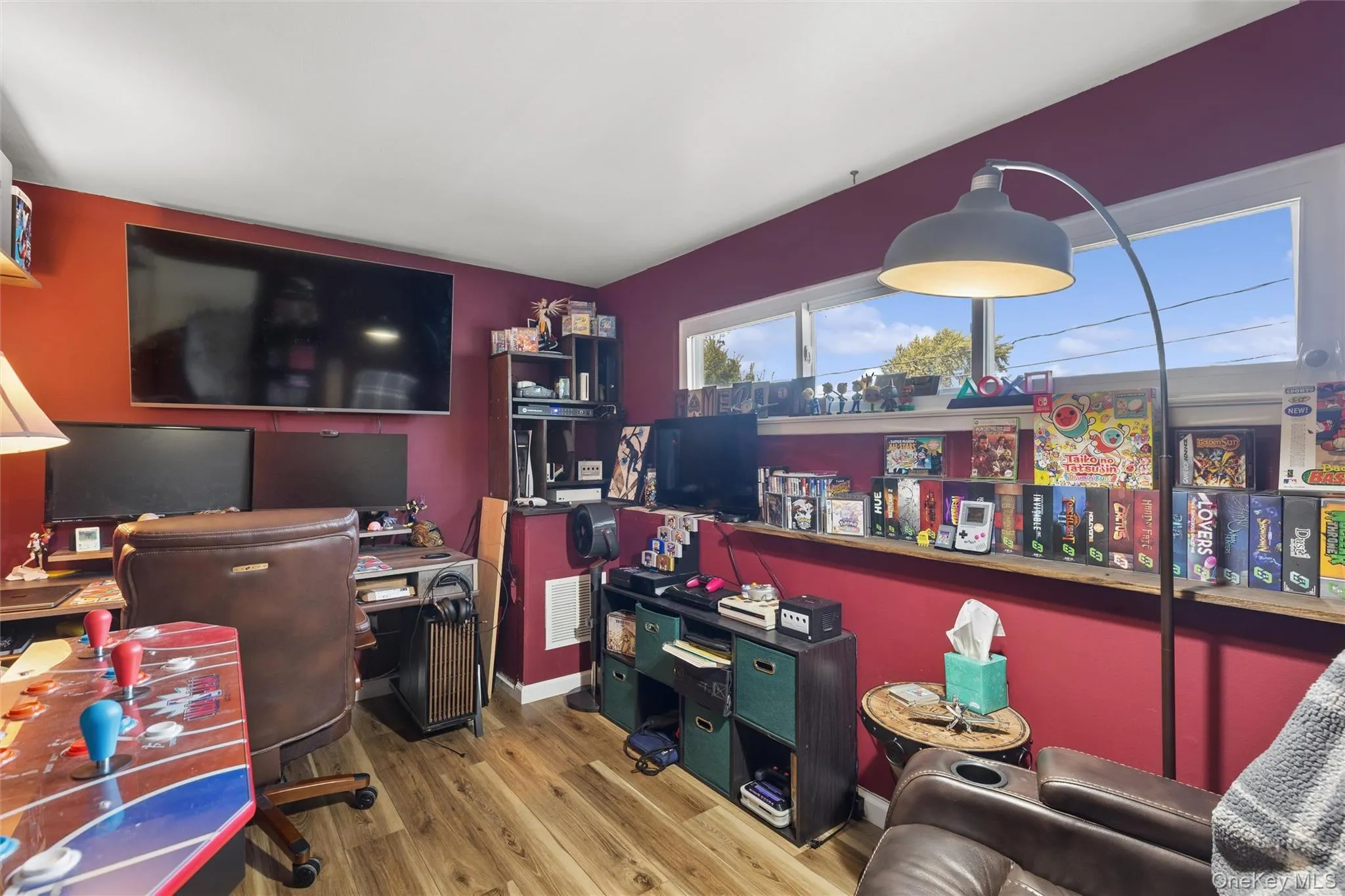 Wood-finish flooring with perimeter shelving Wood-finish flooring with perimeter shelving