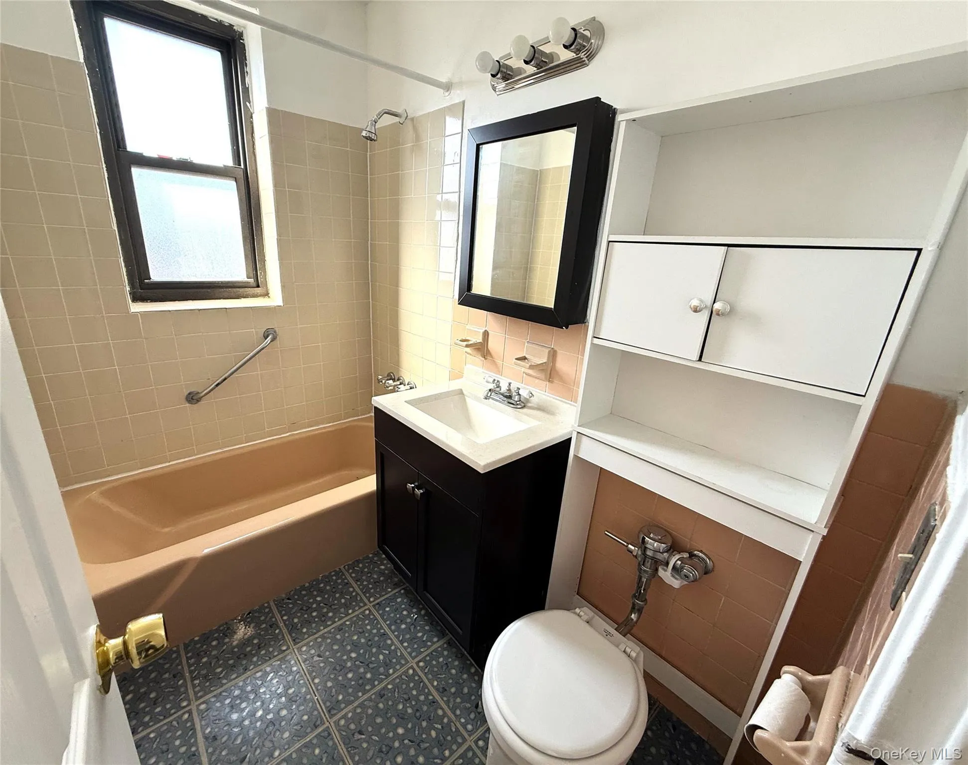 Bathroom with updated vanity and tub/shower. Bathroom with updated vanity and tub/shower.
