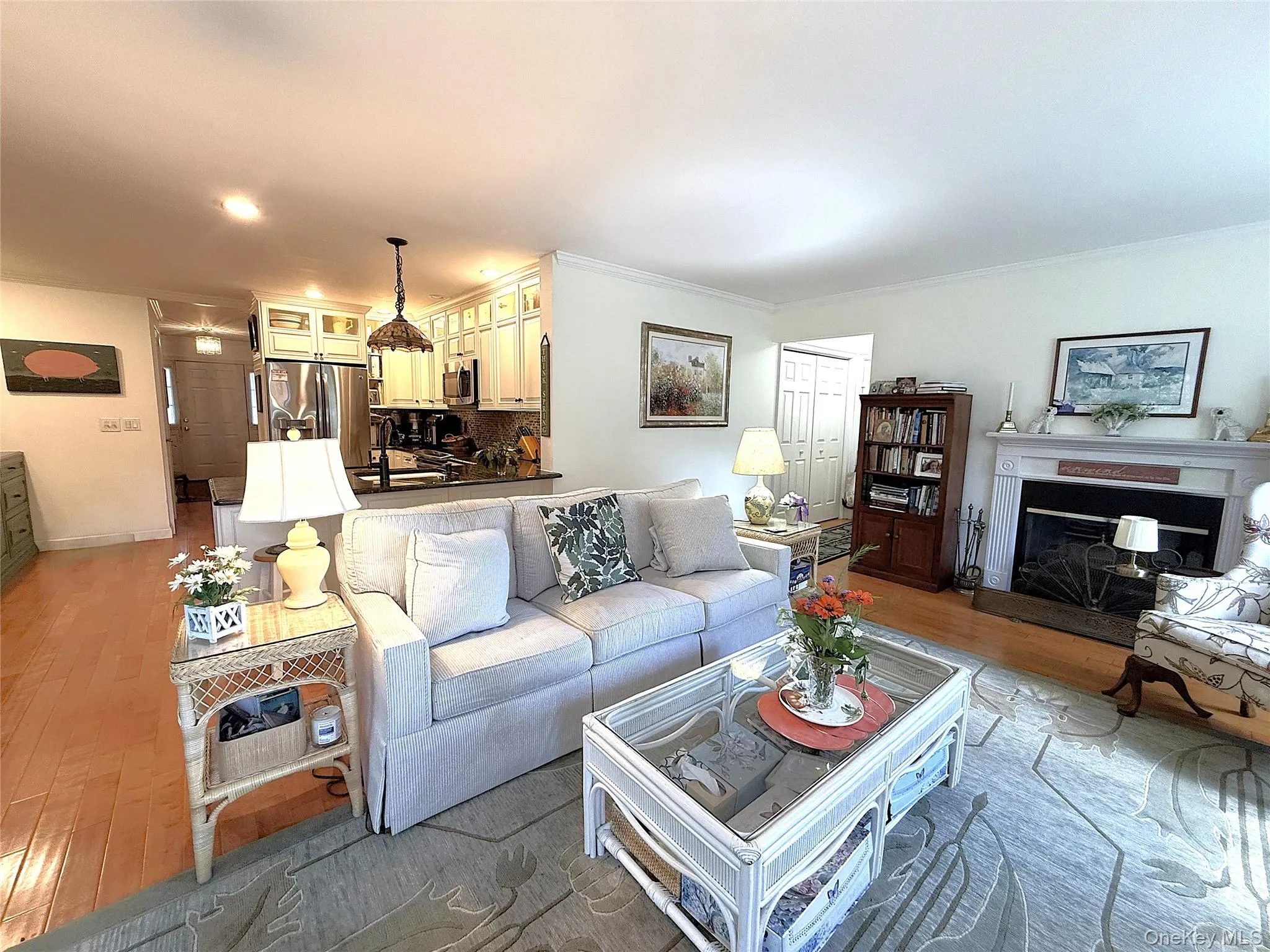 THIS SUNNY FAMILY ROOM IS OPEN TO THE KITCHEN. THIS SUNNY FAMILY ROOM IS OPEN TO THE KITCHEN.