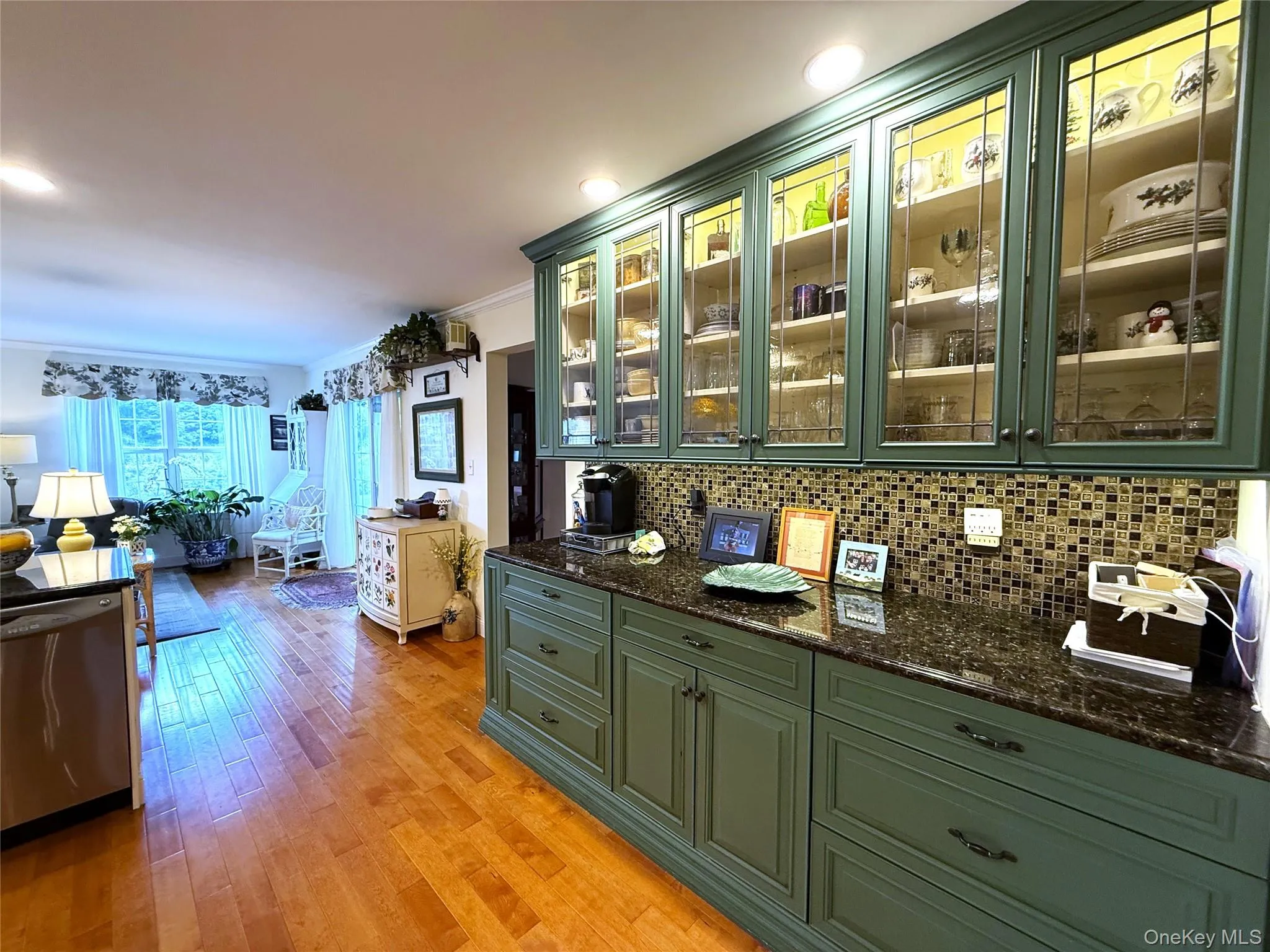KITCHEN FEATURES A FANTASTIC CUSTOM-BUILT CABINET WITH TONS OF STORAGE AND GRANITE COUNTER. KITCHEN FEATURES A FANTASTIC CUSTOM-BUILT CABINET WITH TONS OF STORAGE AND GRANITE COUNTER.