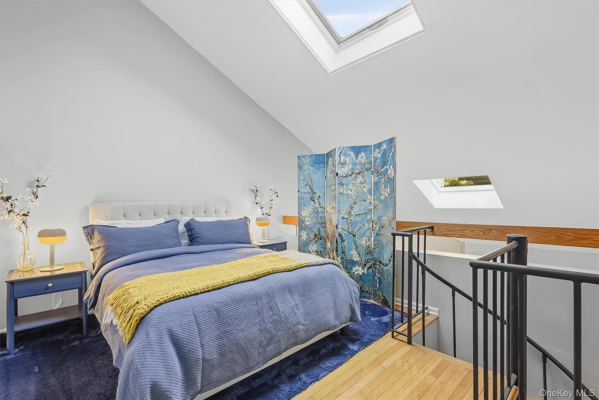 Sun-filled loft with skylights, vaulted ceiling, and flexible space for relaxing, working, or creating. Sun-filled loft with skylights, vaulted ceiling, and flexible space for relaxing, working, or creating.