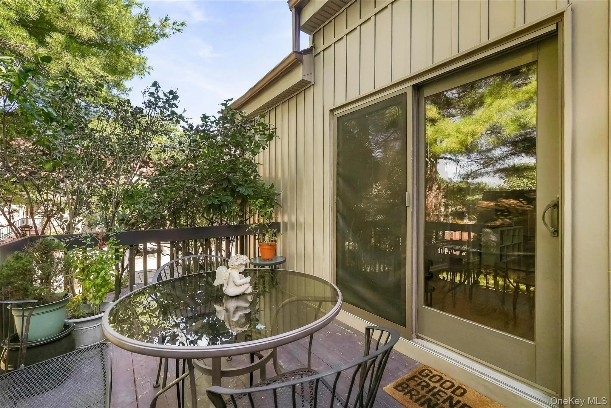 Private deck surrounded by mature greenery, perfect for morning coffee or winding down outdoors. Private deck surrounded by mature greenery, perfect for morning coffee or winding down outdoors.