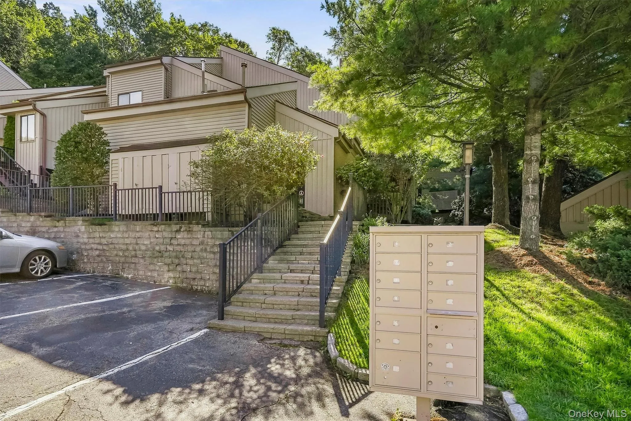Peaceful end-unit setting surrounded by mature trees and landscaped community grounds. Peaceful end-unit setting surrounded by mature trees and landscaped community grounds.