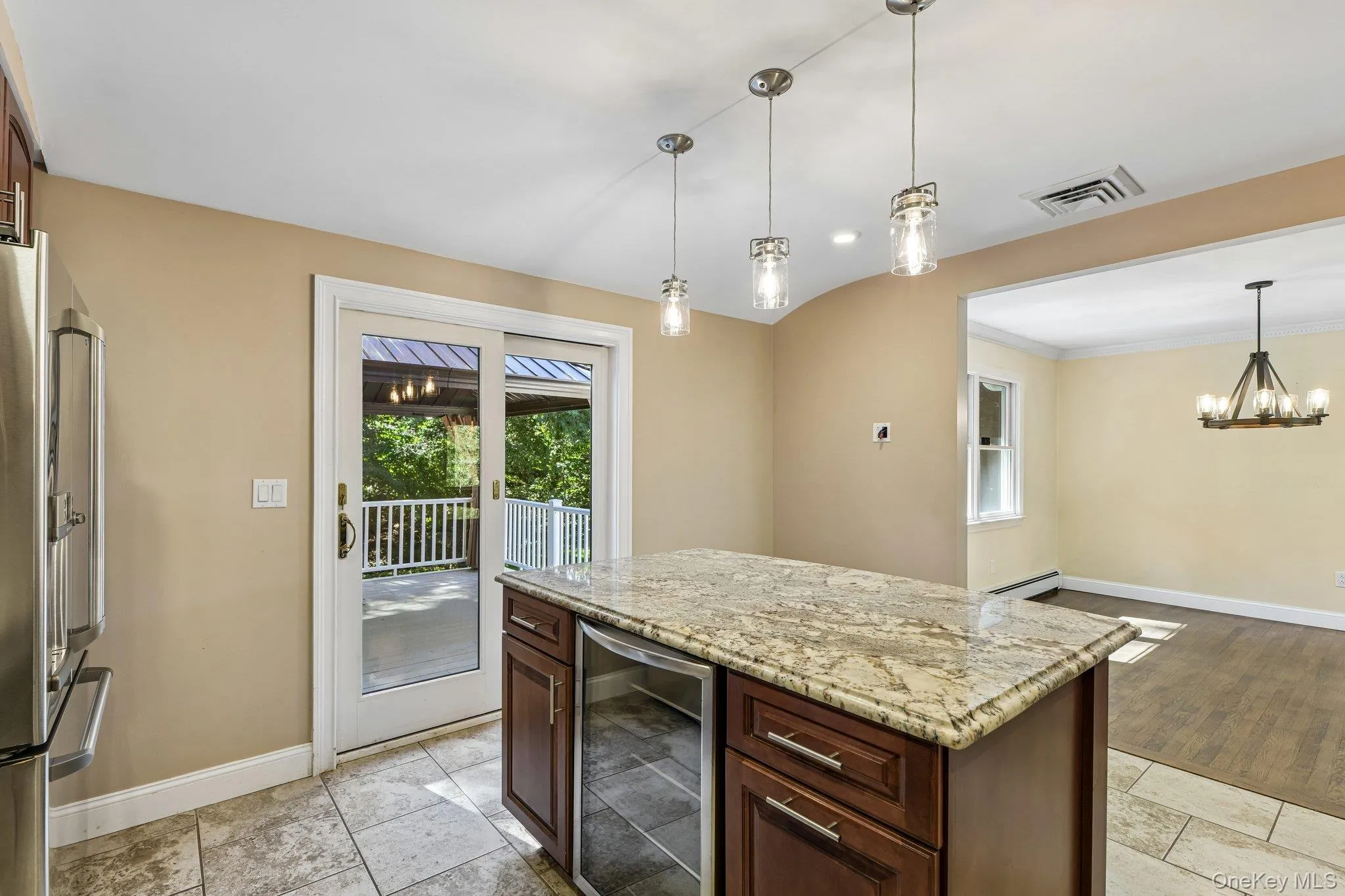 Large center island with beverage refrigerator Large center island with beverage refrigerator