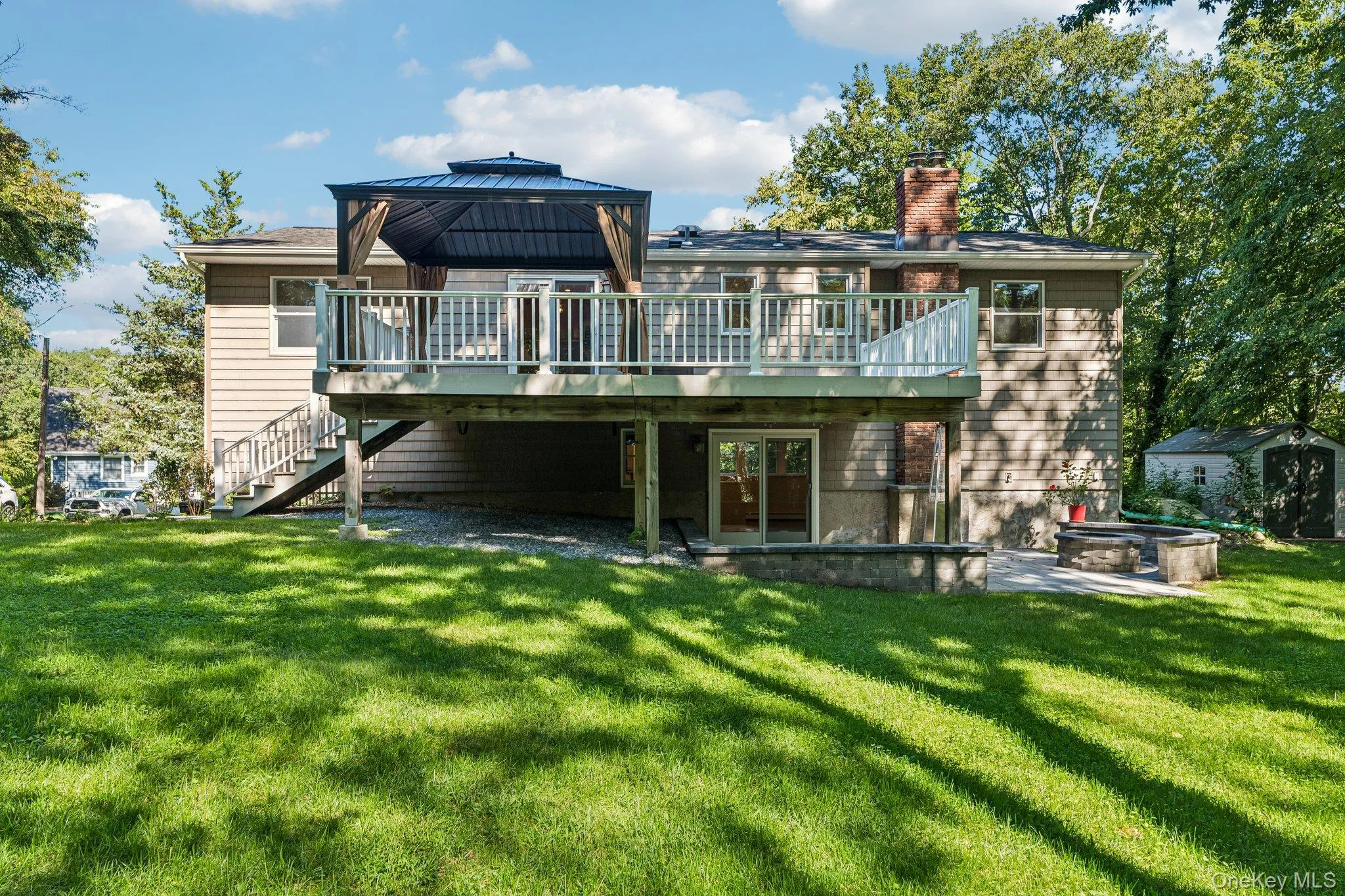 Great for entertaining, backyard guests can sit on the deck or under a covered patio Great for entertaining, backyard guests can sit on the deck or under a covered patio