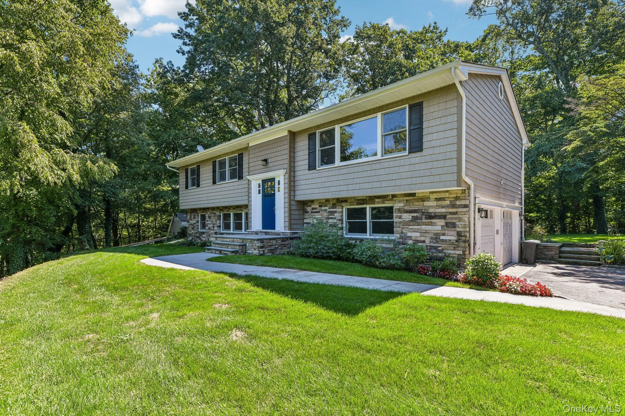 Cedar impressions siding with stone accents Cedar impressions siding with stone accents