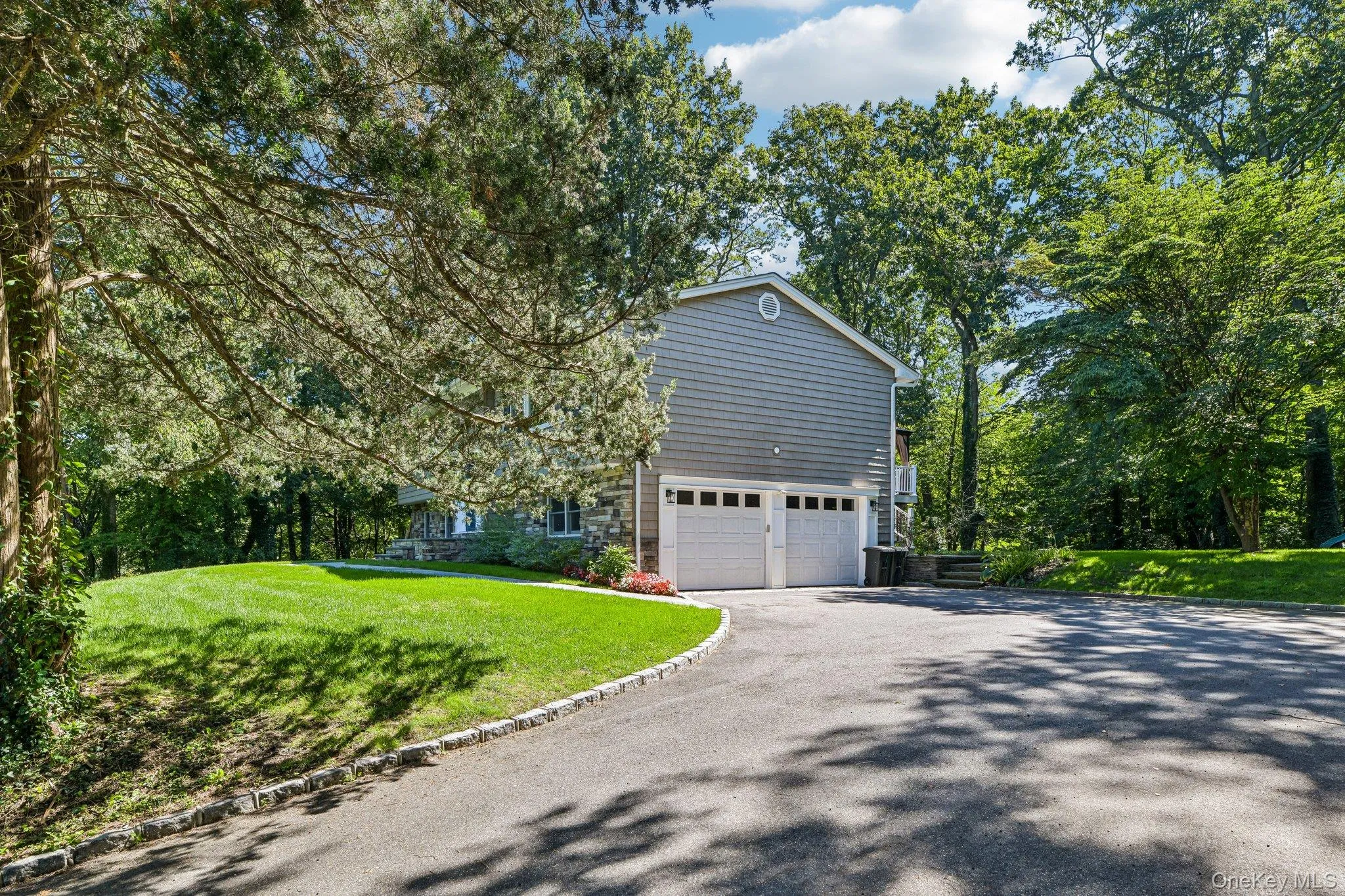Two-car garage with access to the first floor Two-car garage with access to the first floor