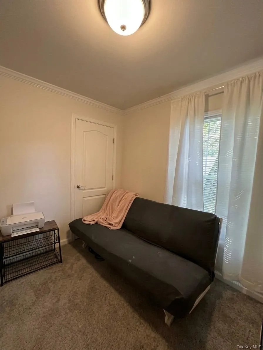 Recessed ceiling light fixture and crown molding. Recessed ceiling light fixture and crown molding.