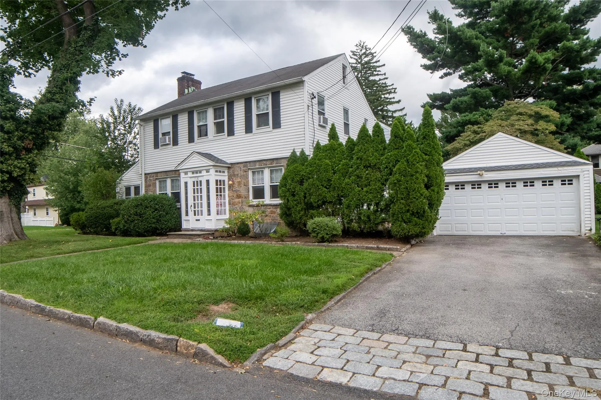 Front Structure showing two-car garage and two car driveway. Front Structure showing two-car garage and two car driveway.