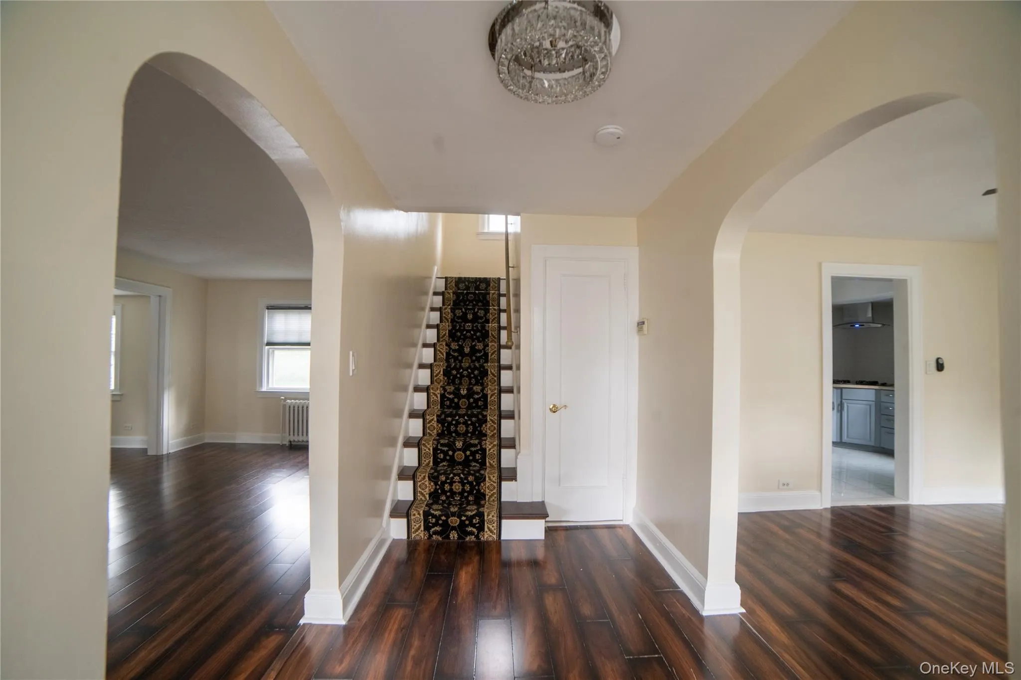 Entrance foyer showing beautiful floors to living room, dining room and stairs to the bedrooms floor. Entrance foyer showing beautiful floors to living room, dining room and stairs to the bedrooms floor.