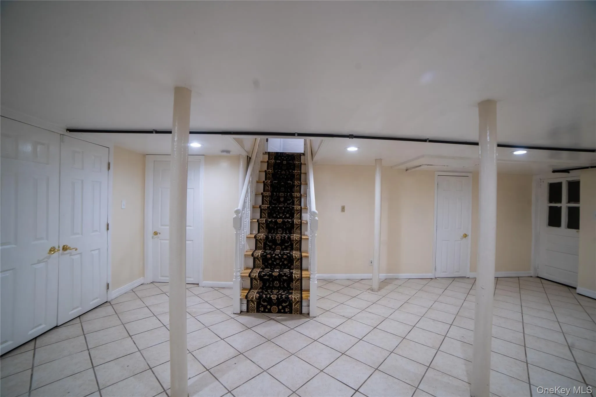 Family room in the basement with access to laundry and access to a full bathroom. Family room in the basement with access to laundry and access to a full bathroom.