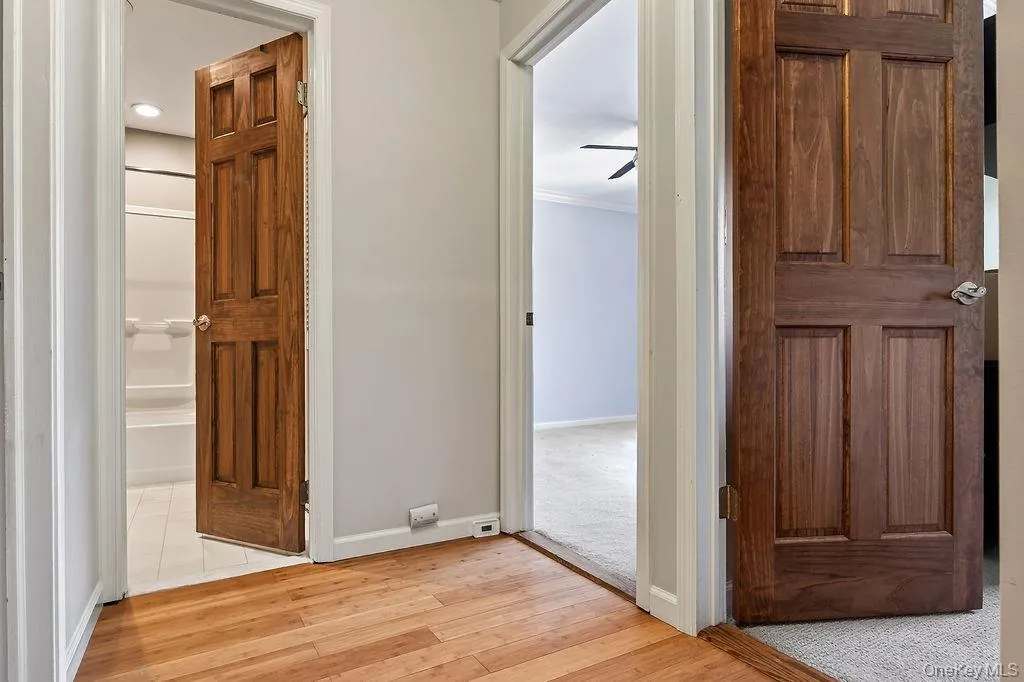upstairs hallway, leading to bathroom and rooms upstairs hallway, leading to bathroom and rooms