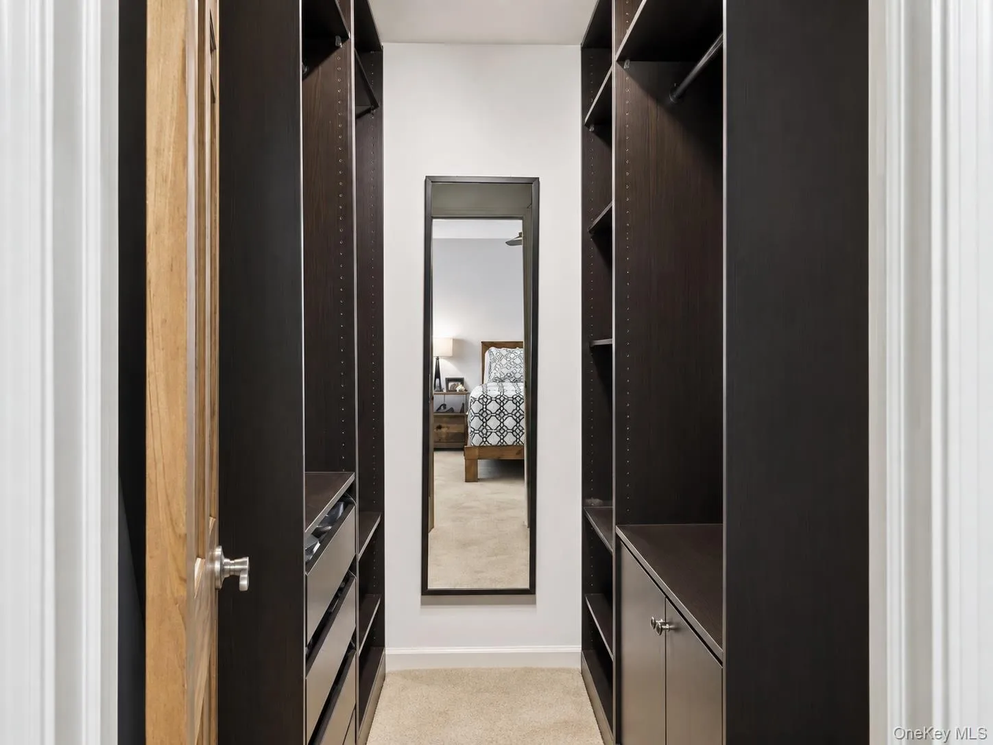 Primary Bedroom walk-in closet Primary Bedroom walk-in closet