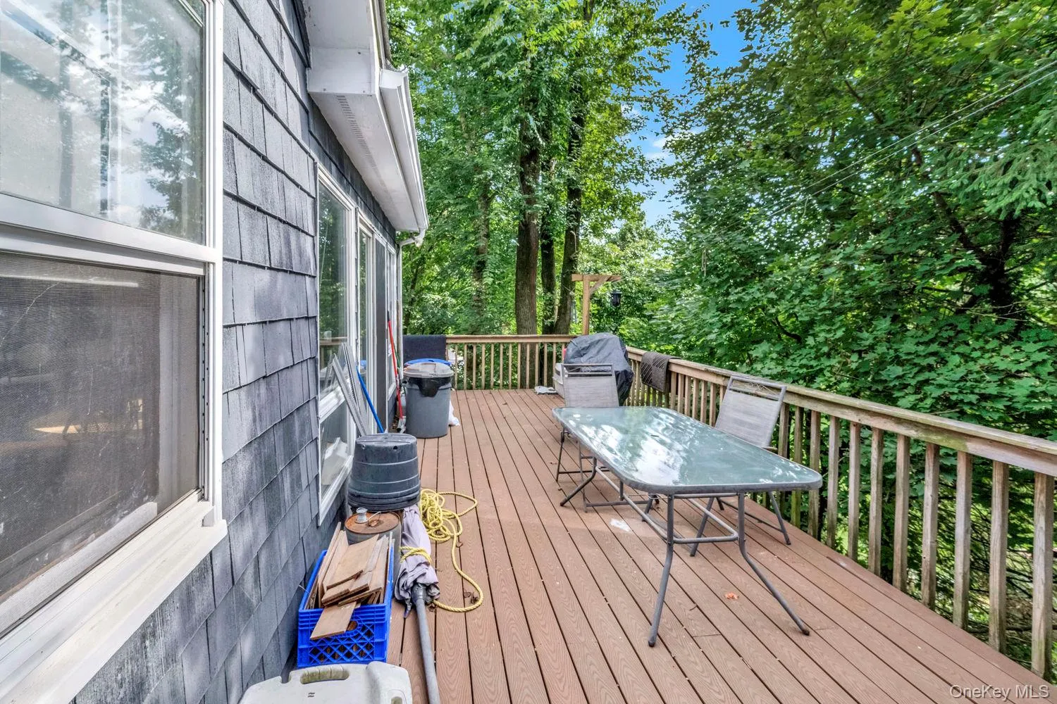 Deck with ample trees for privacy. Deck with ample trees for privacy.