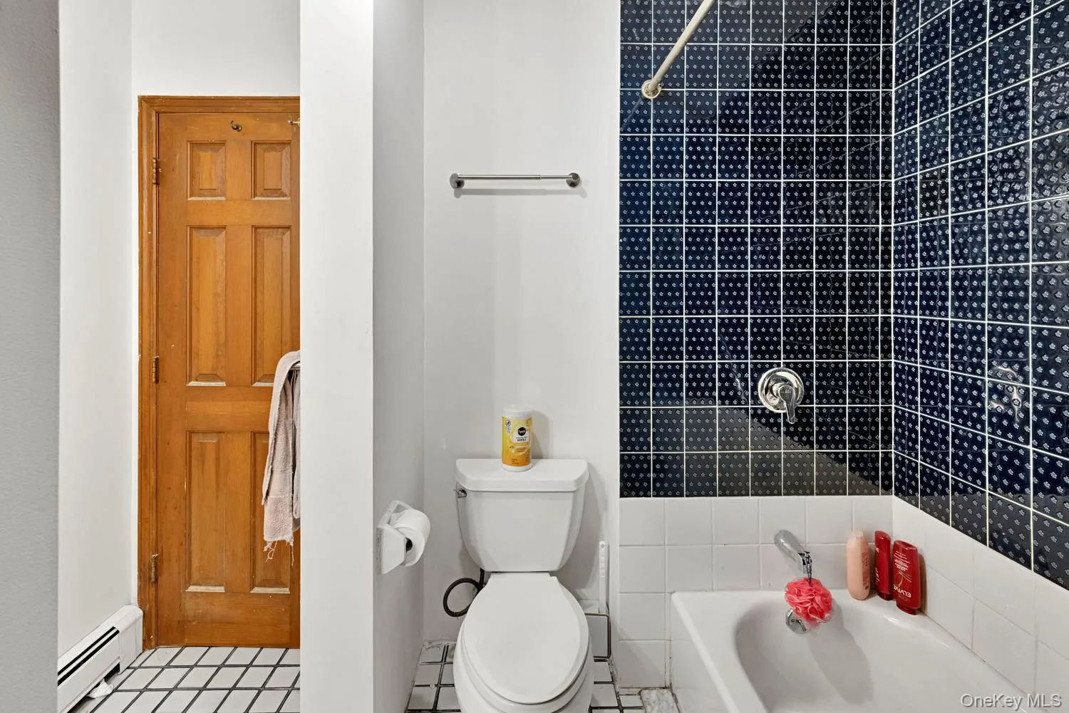 Second full bathroom on the first floor, with bathtub. Second full bathroom on the first floor, with bathtub.