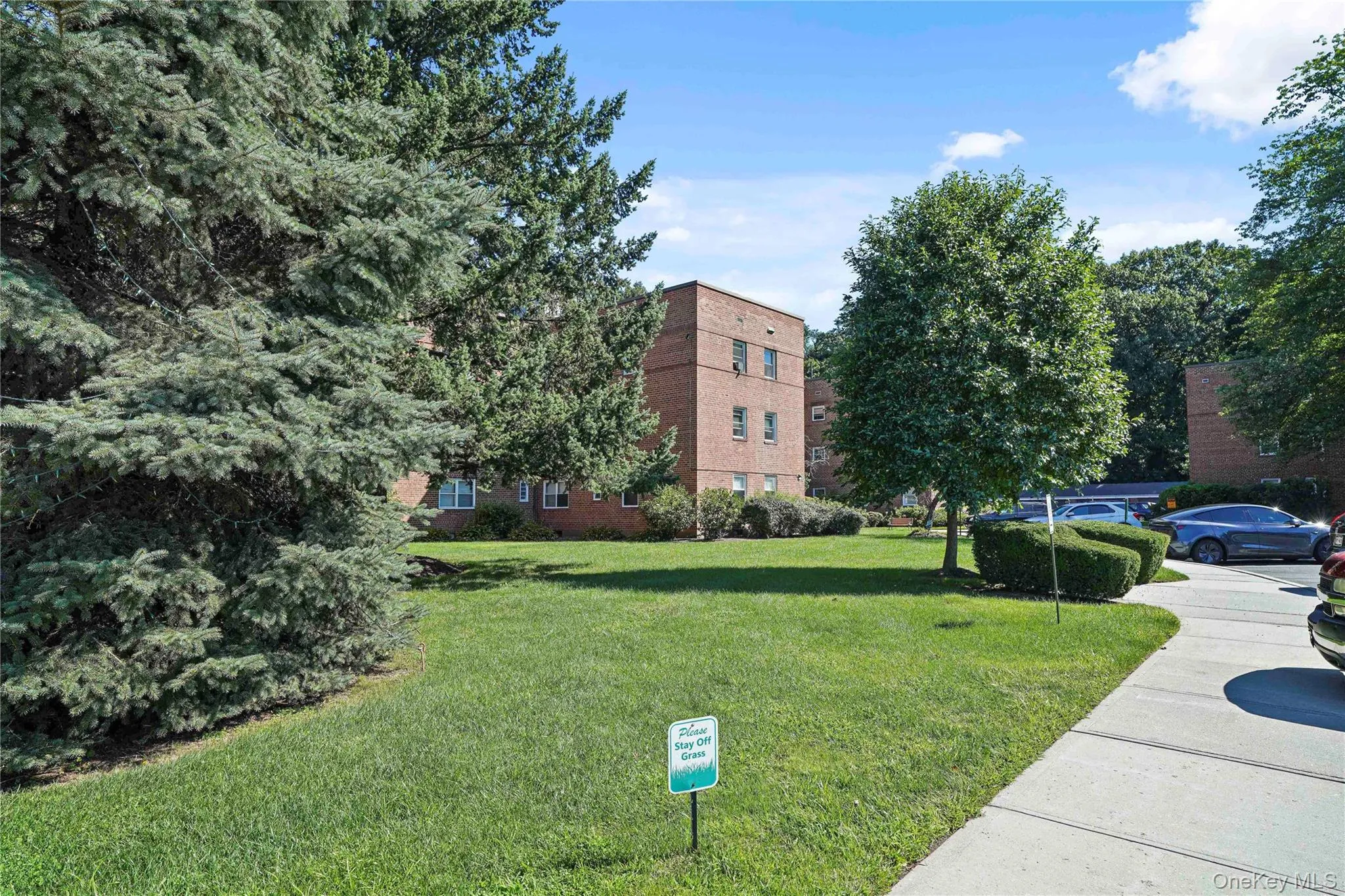 Expansive grounds with parking available right outside Building D. Expansive grounds with parking available right outside Building D.