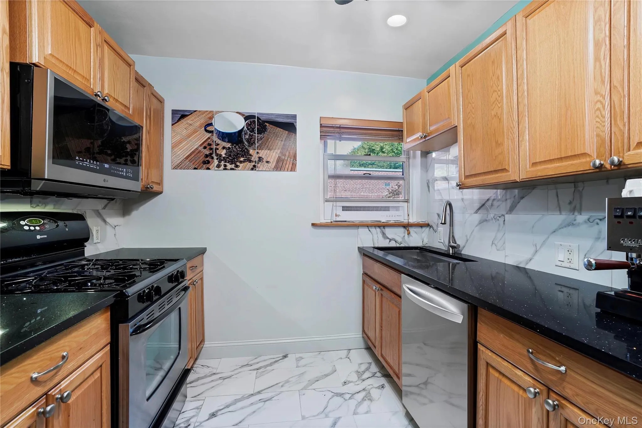 Updated kitchen with quartz countertops. Updated kitchen with quartz countertops.