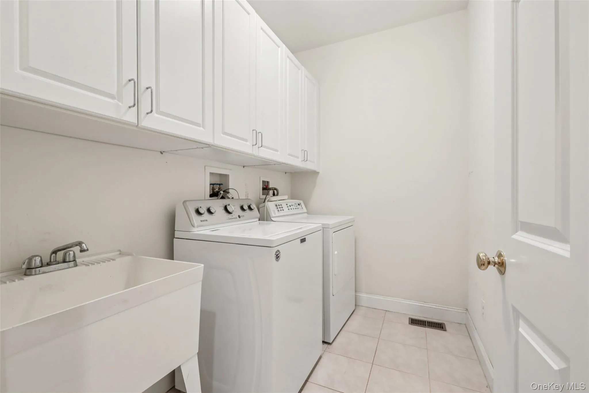 Laundry area located just outside the Owner's Suite Laundry area located just outside the Owner's Suite