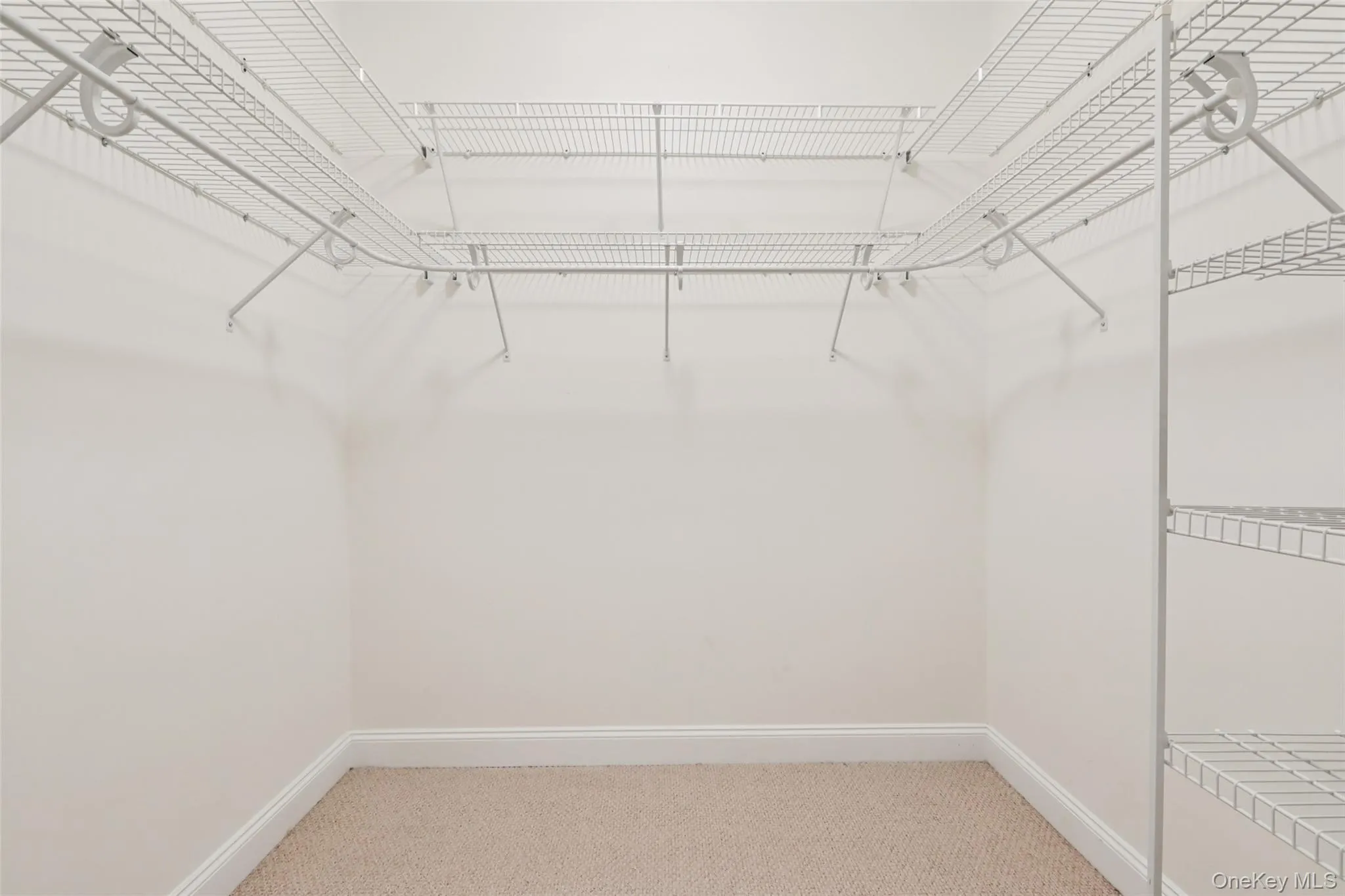 One of the 2 walk-in closets located in the Owner's Suite One of the 2 walk-in closets located in the Owner's Suite