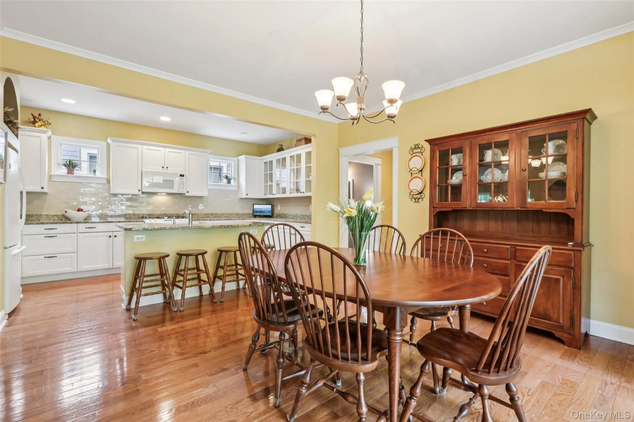 Dining area opens into the large Kitchen with breakfast counter Dining area opens into the large Kitchen with breakfast counter