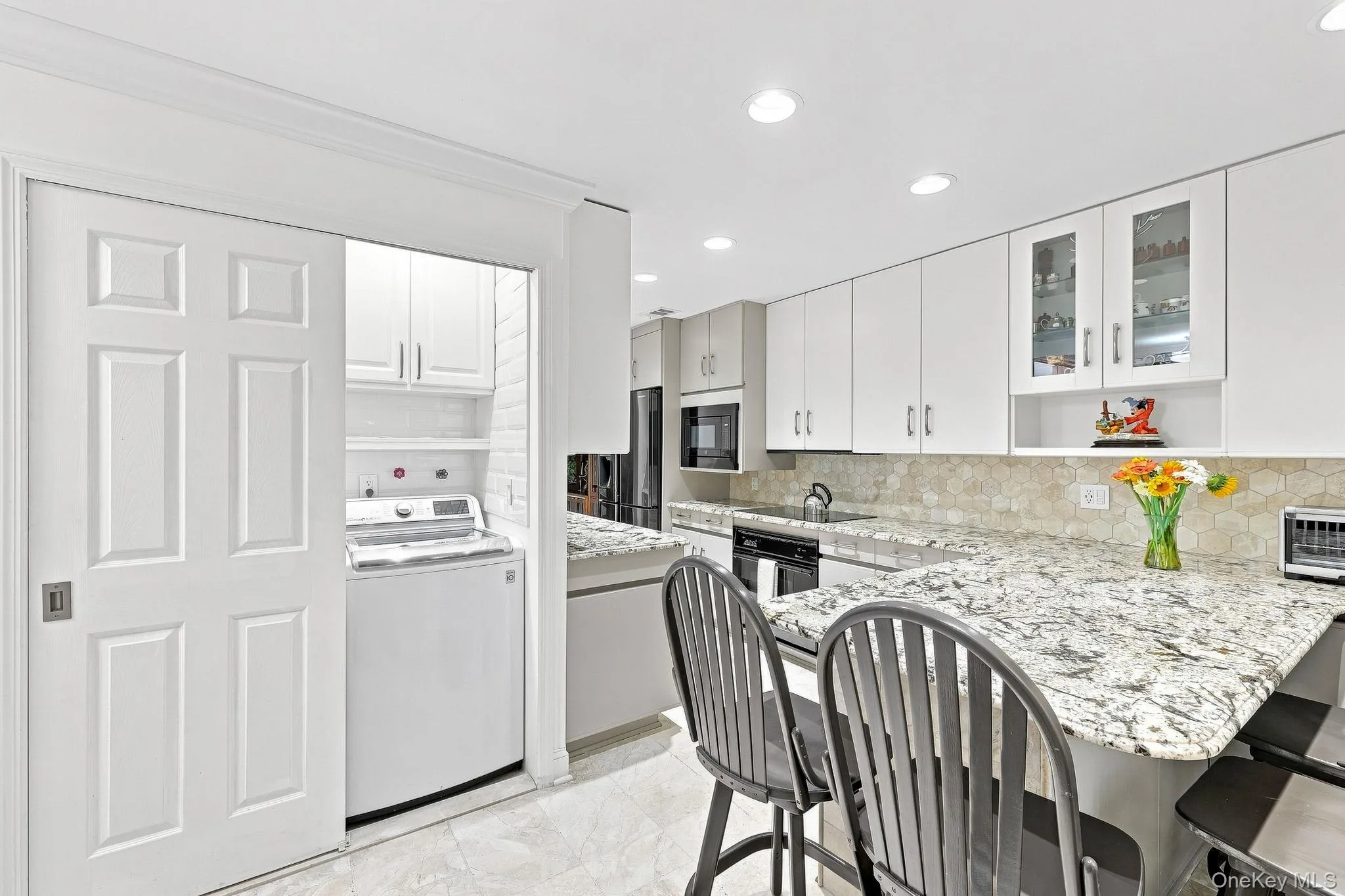 There is a full-size washer and dryer in the lighted laundry closet with finished cabinetry for your cleaning and wash products There is a full-size washer and dryer in the lighted laundry closet with finished cabinetry for your cleaning and wash products