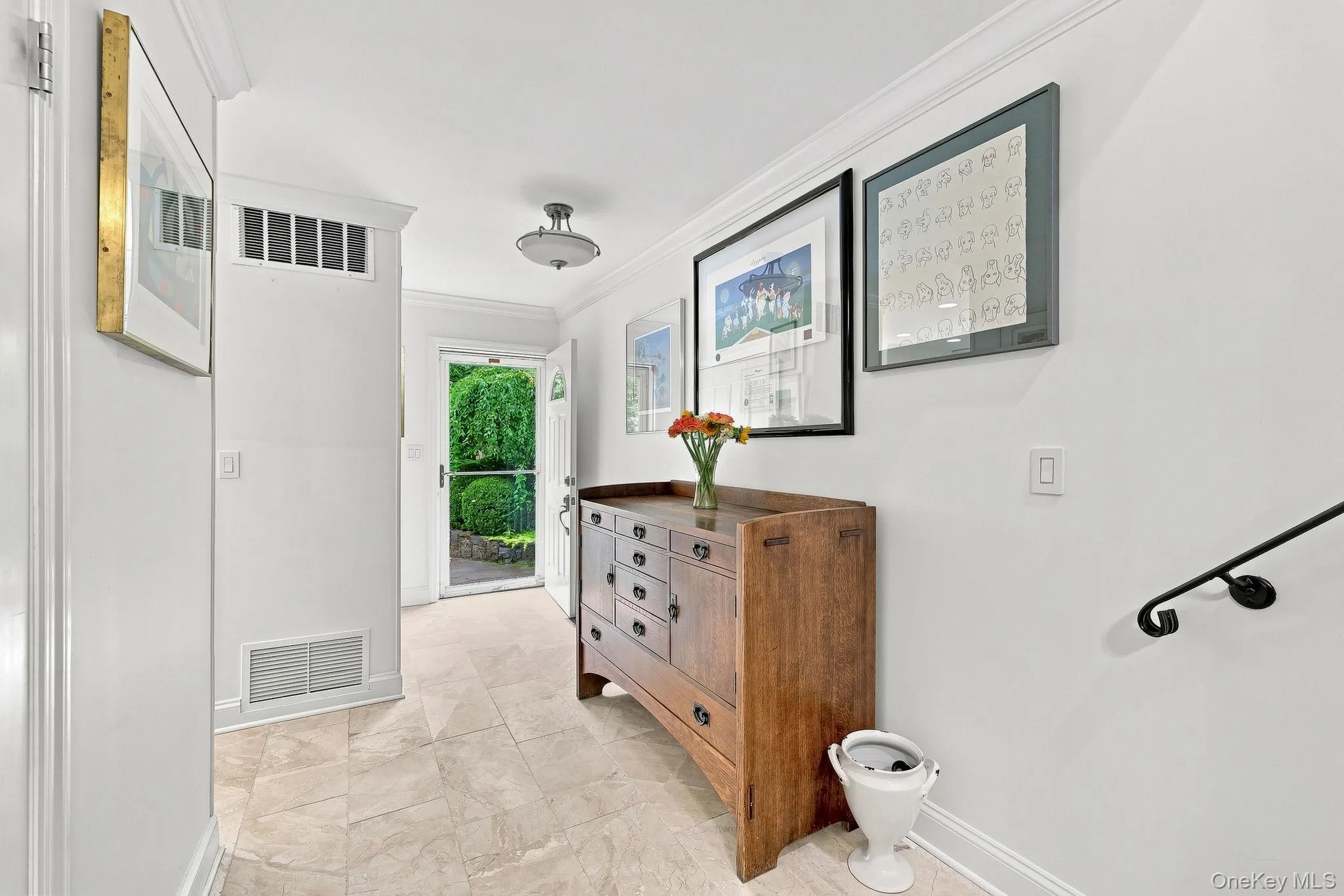 The large entry foyer has a coat closet and will accommodate your furniture and artwork The large entry foyer has a coat closet and will accommodate your furniture and artwork