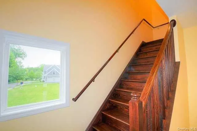 Stairway to 2nd floor. Note large window! Stairway to 2nd floor. Note large window!