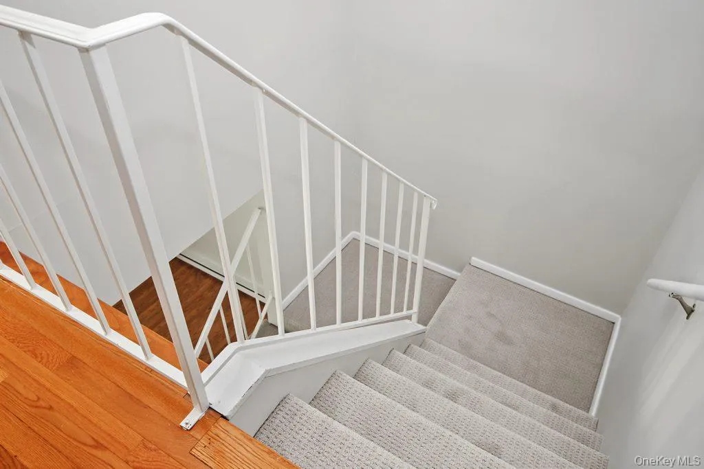 Stairs between 1st & 2nd Floors w/brand new carpeting Stairs between 1st & 2nd Floors w/brand new carpeting